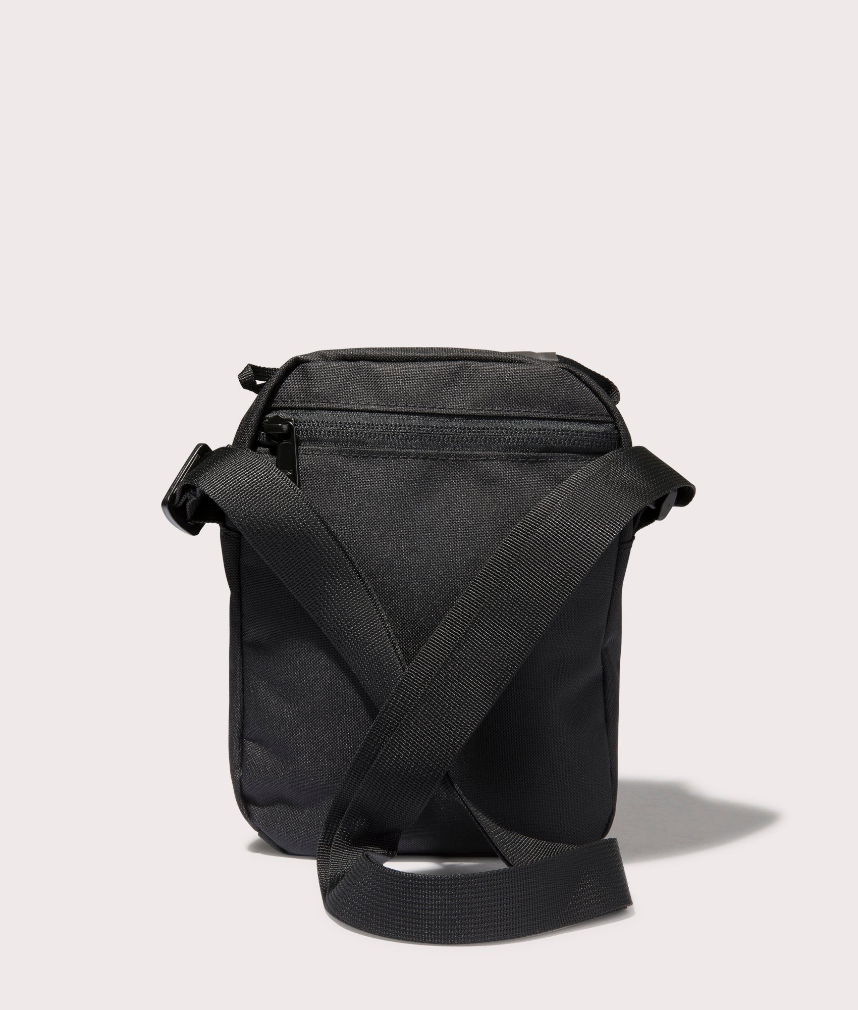The North Face Jester Crossbody Bag in Black at EQVVS. Back Shot.