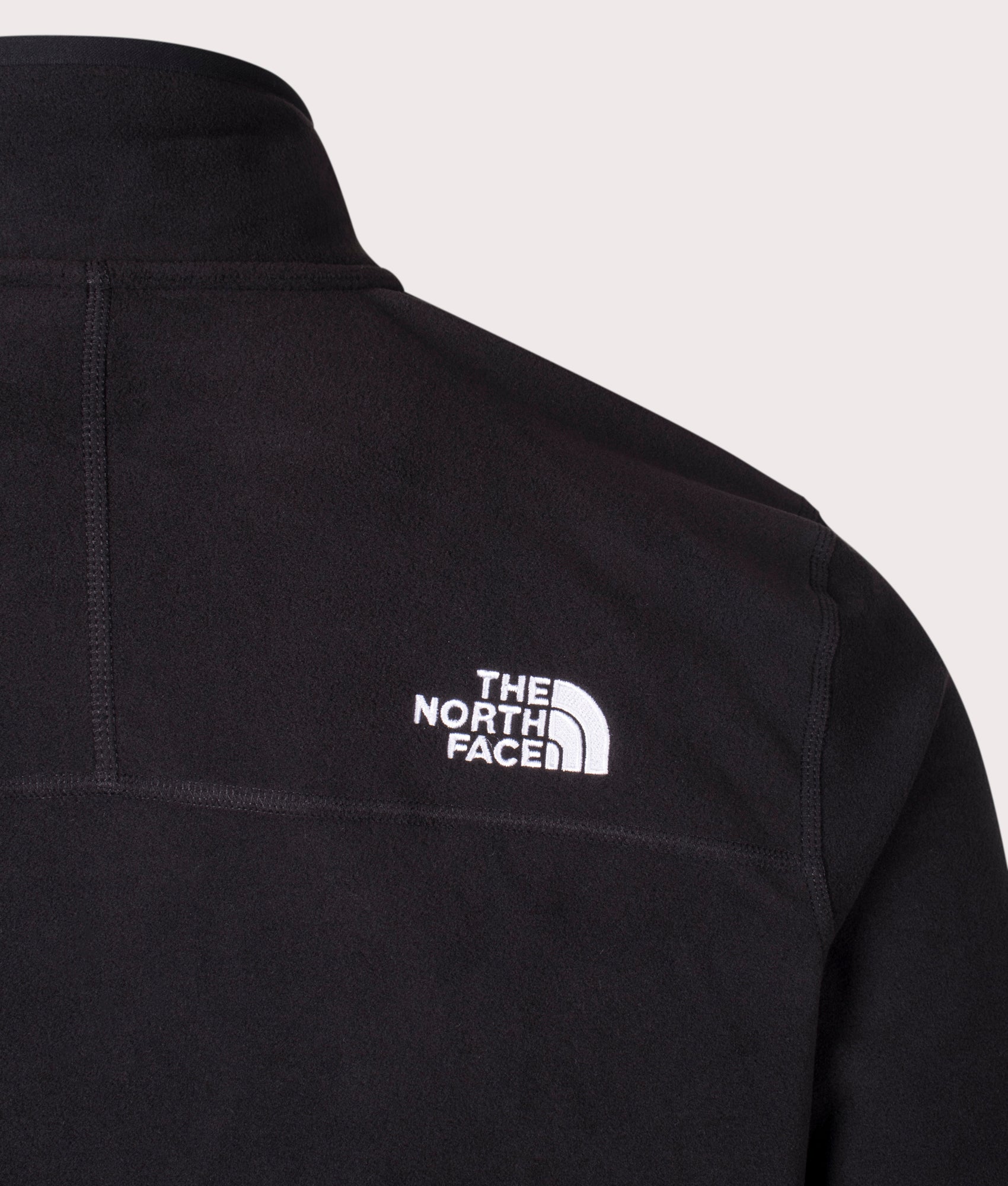 The North Face Quarter Zip 100 Glacier Fleece in Black at EQVVS. Back Detail Shot.