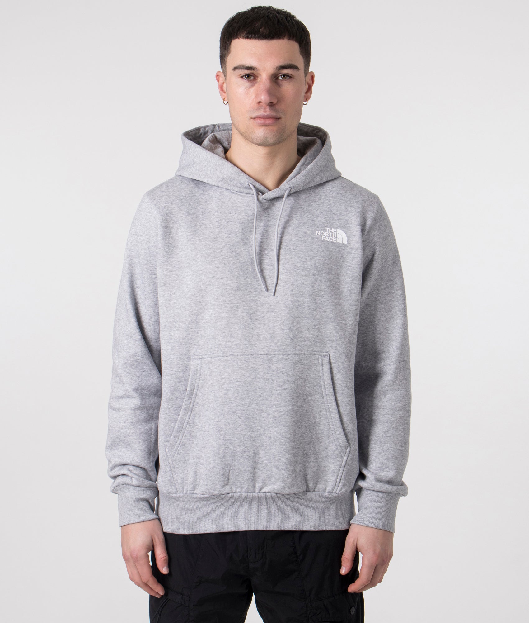 The North Face Simple Dome Hoodie in Grey Heather. Shot at EQVVS.  Front model shot. 