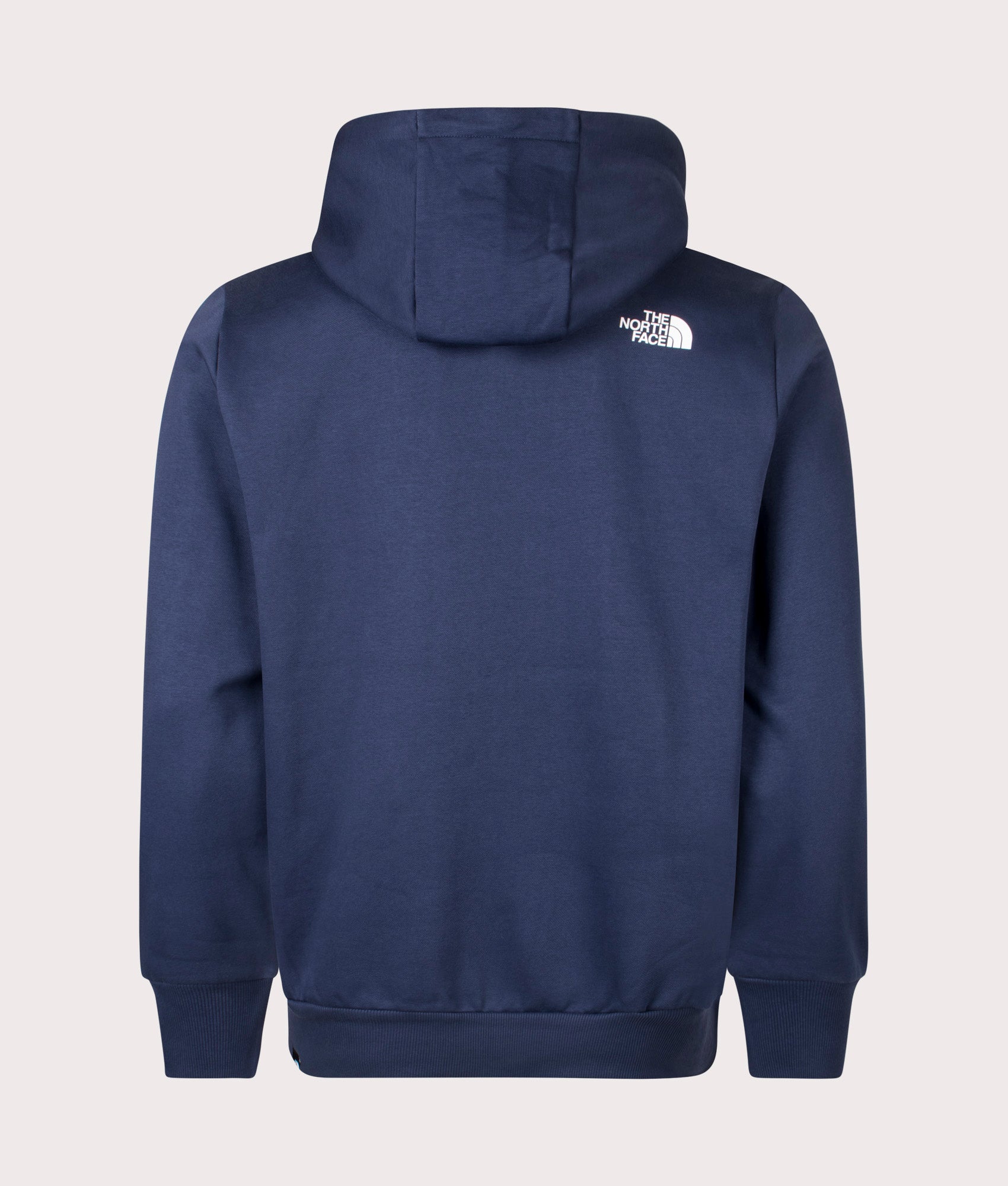 The North Face drop the The Simple Dome Hoodie in Summit Navy at EQVVS Menswear. Back shot.