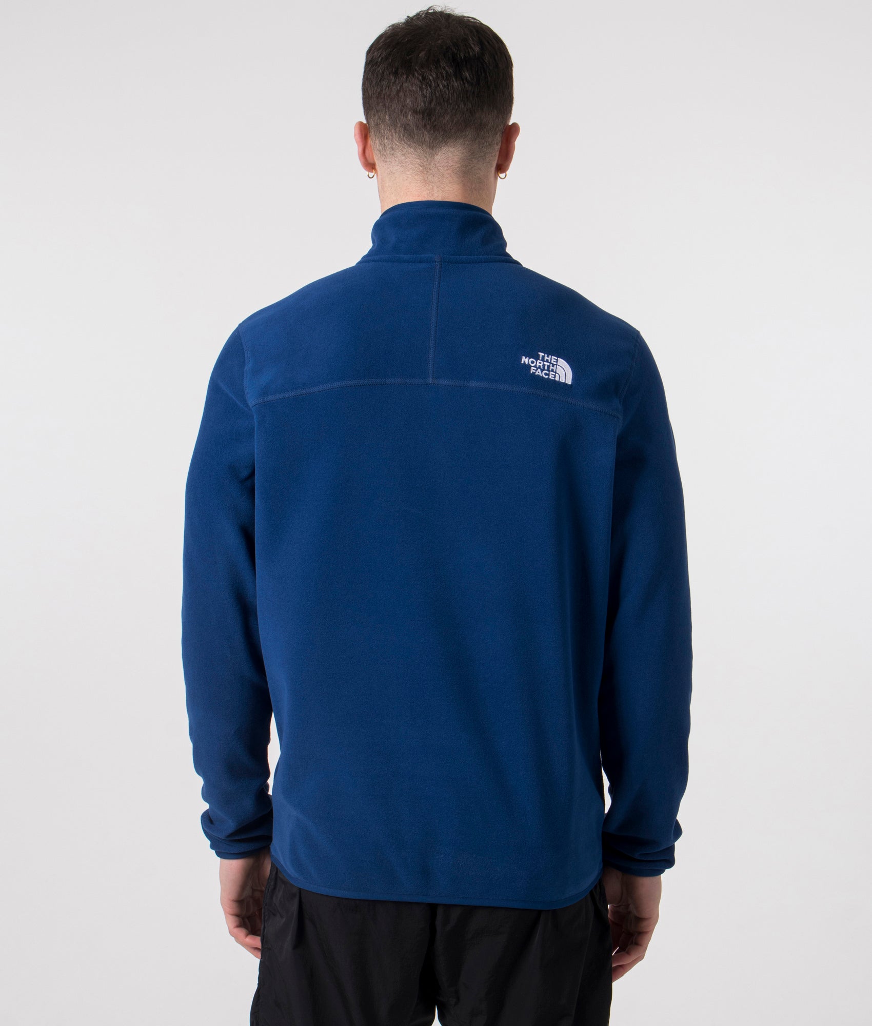 The North Face Quarter Zip 100 Glacier Fleece in Estate Blue. Shot at EQVVS. Back model shot. 