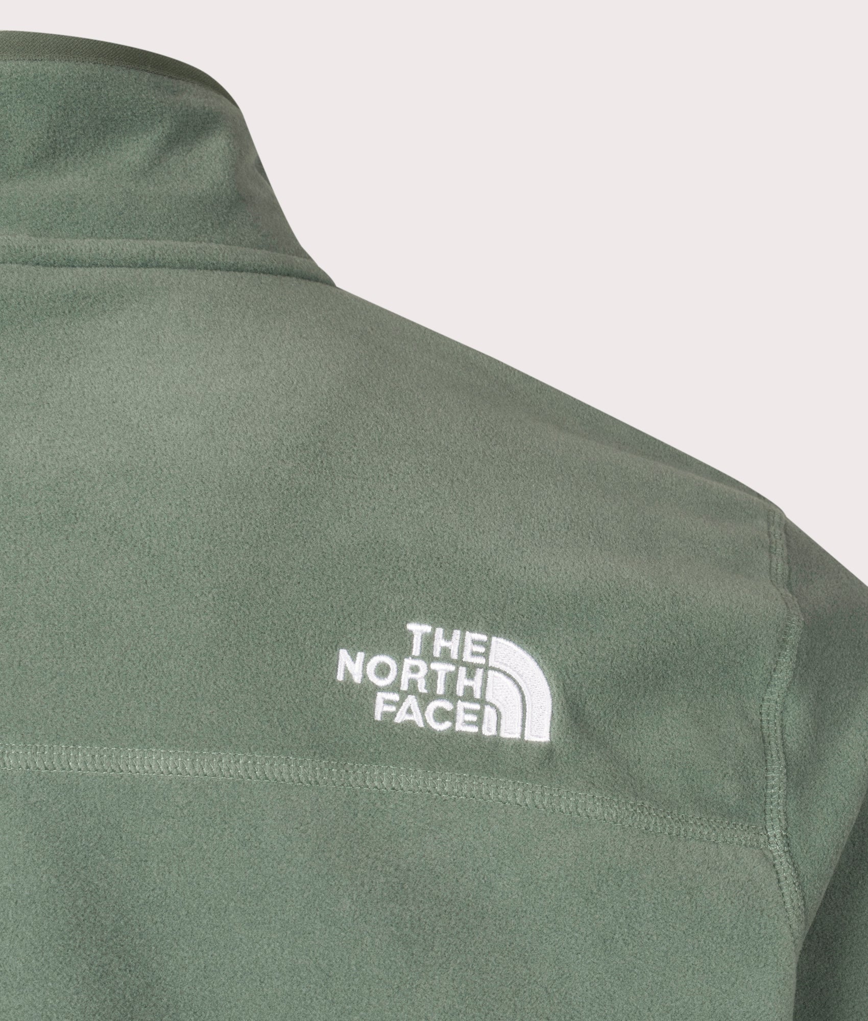 The North Face Quarter Zip 100 Glacier Fleece in Duck Green. Back Detail Shot at EQVVS.