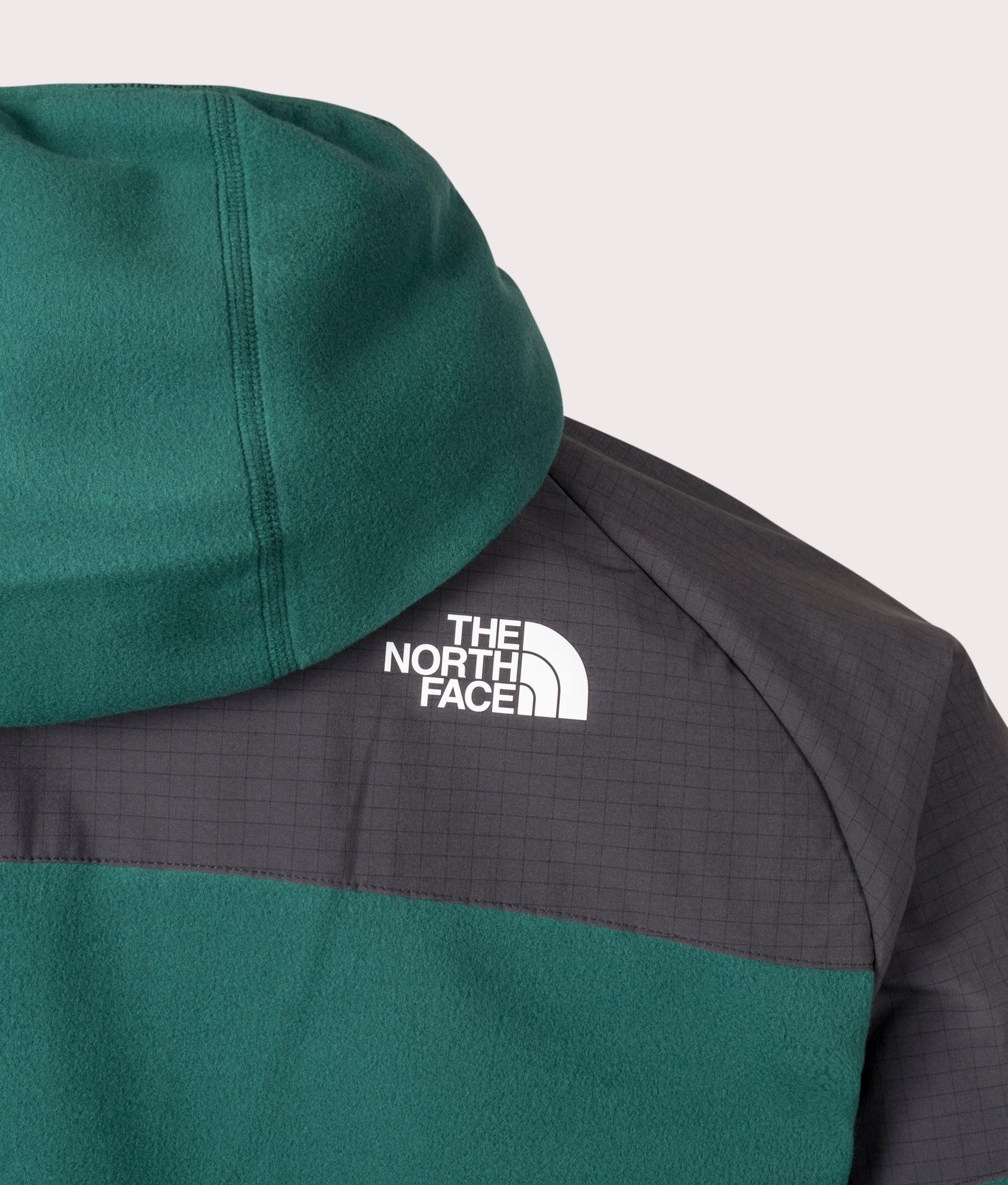The North Face Glacier Heavyweight Zip Through Hoodie in Deep Nori Green and Asphalt Grey. EQVVS back detail Shot.