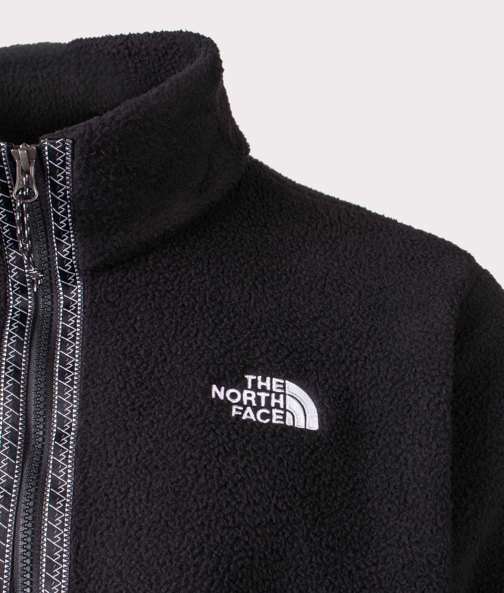 The North Face TNF Quarter Zip Fleeski in Black. Shot at EQVVS.  Detail mannequin shot. 