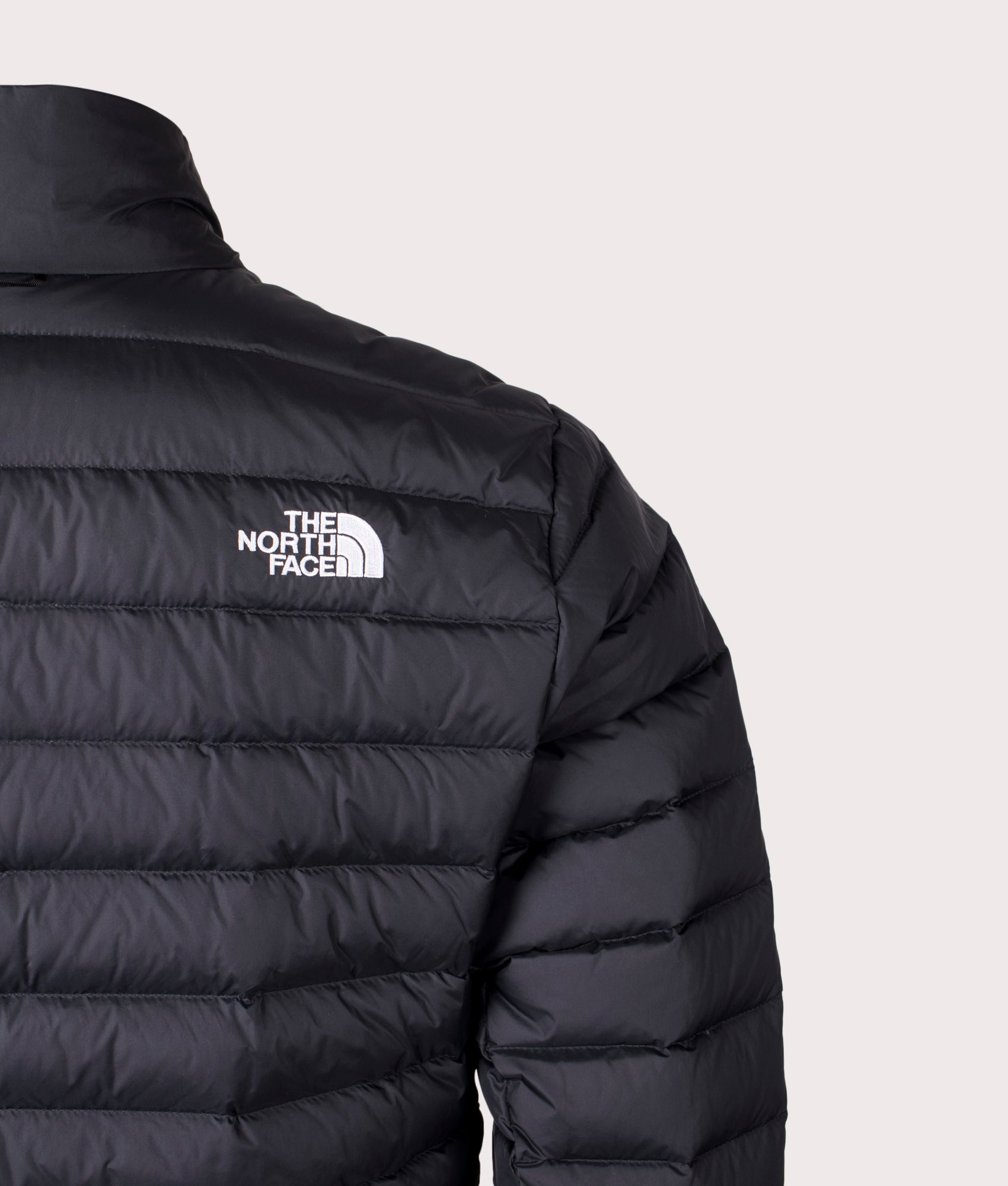 The North Face Classic Down Jacket in TNF Black at EQVVS Menswear. Back detail shot.