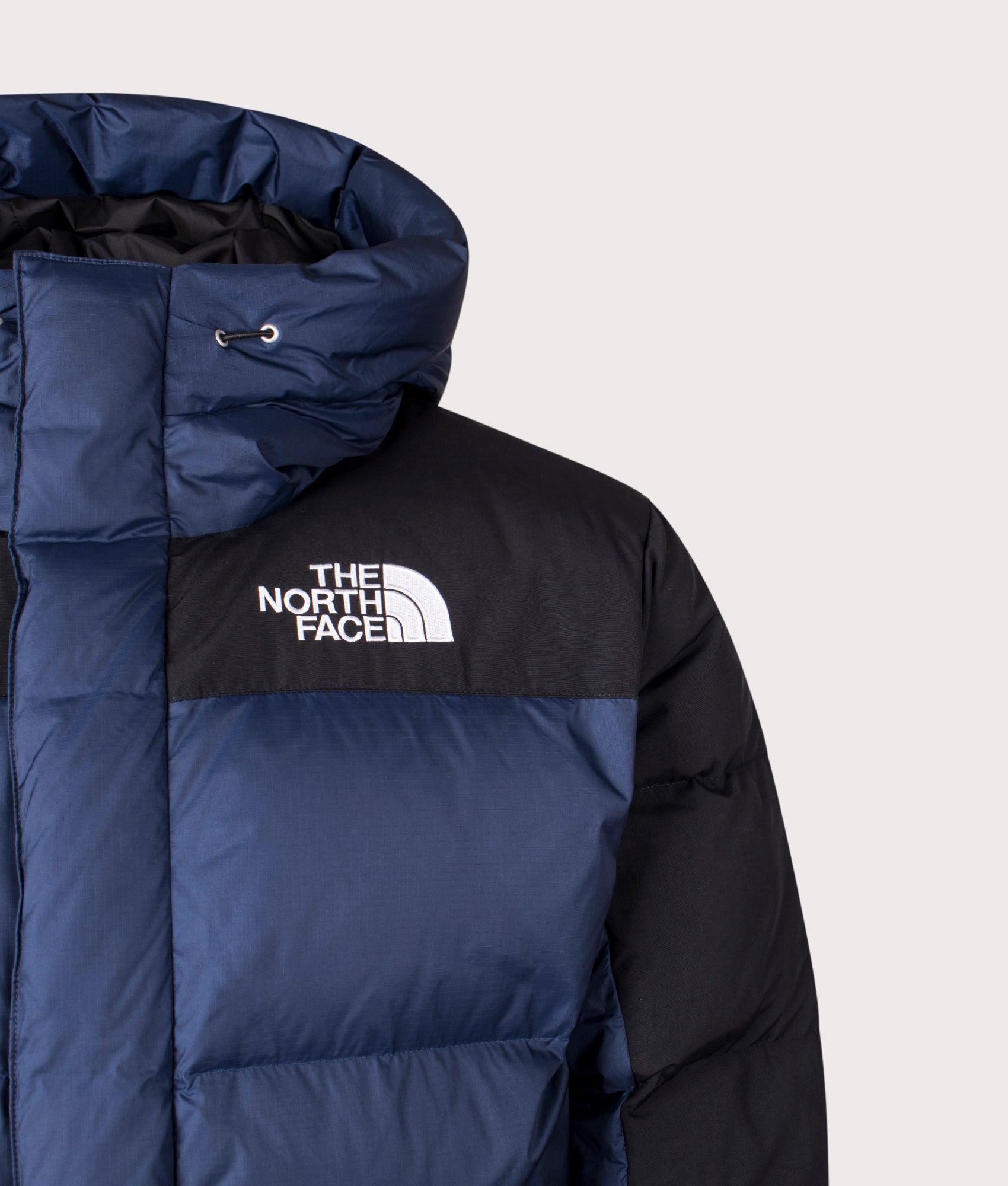 The North Face Himalayan Down Parka in Summit Navy/TNF Black at EQVVS Menswear. Detail Shot.