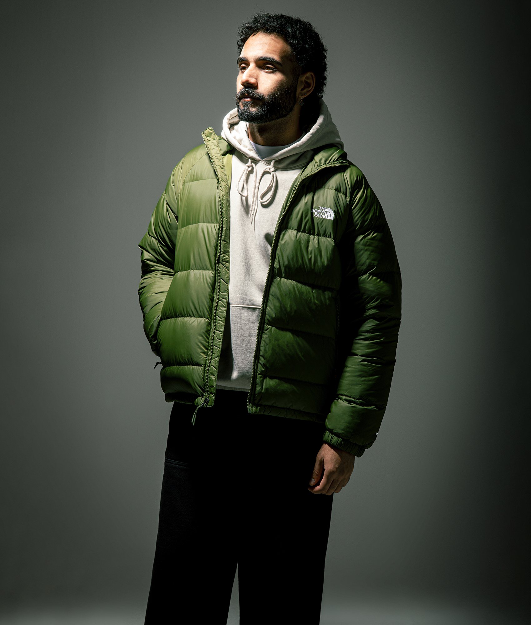 Hydrenalite Hooded Down Jacket in Woodland Green | The North Face | EQVVS | Campaign shot.