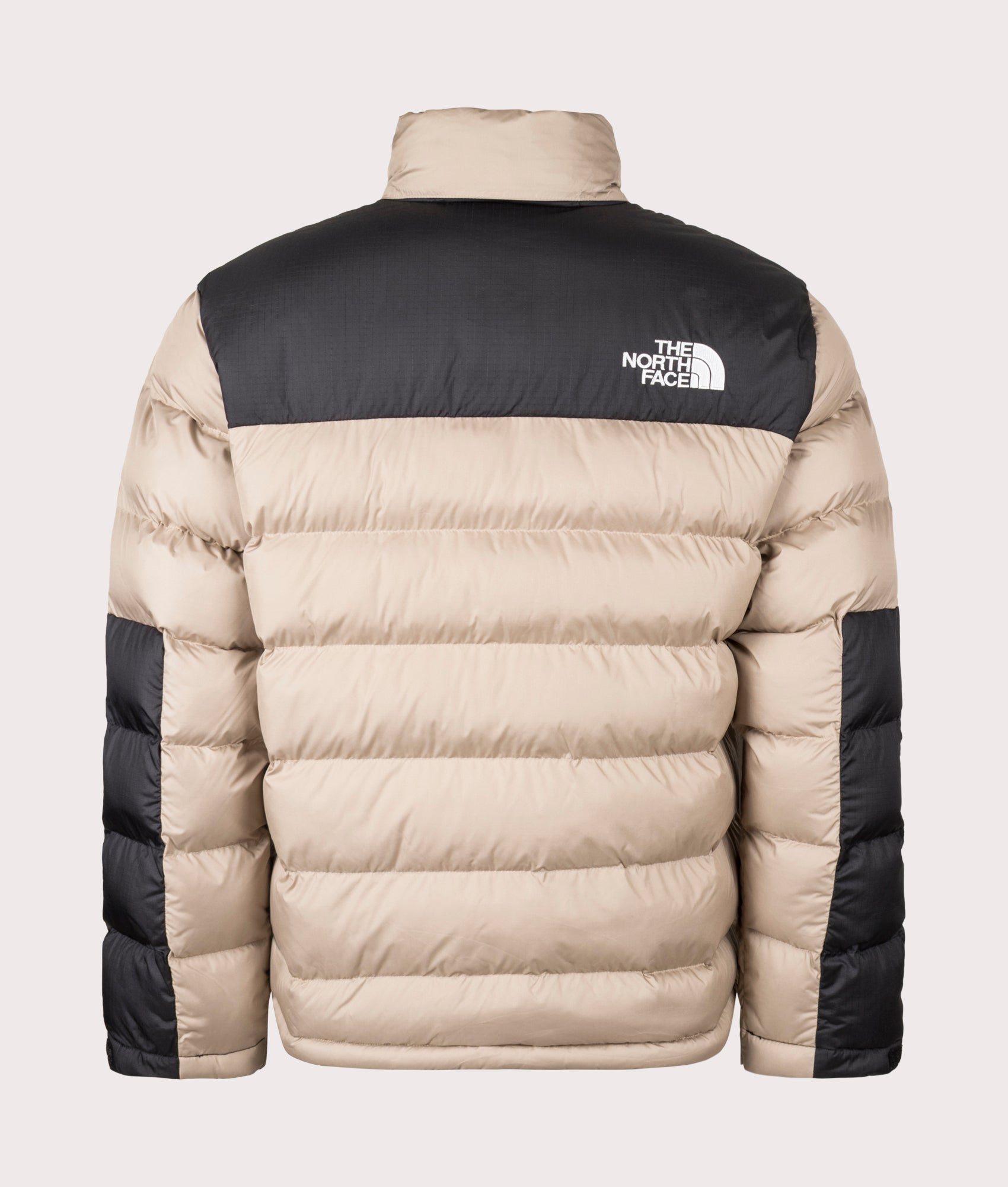 The North Face Limbara Insulated Jacket in Mushroom Grey at EQVVS Menswear. Back shot. 