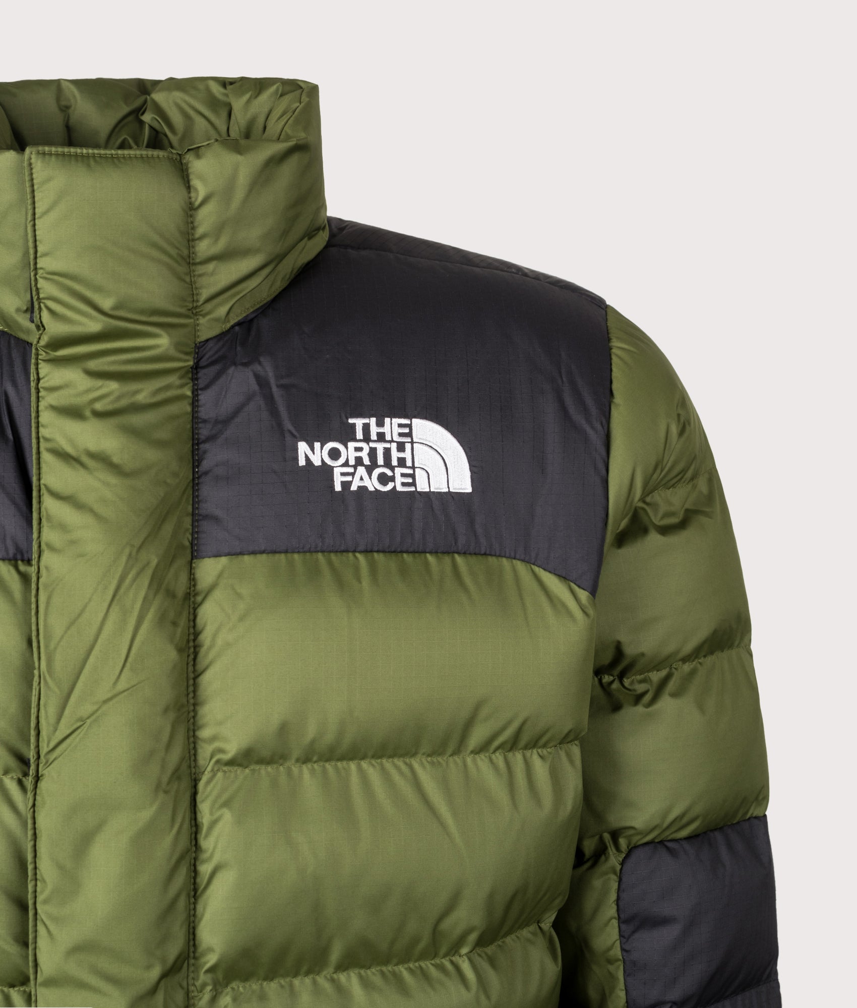 Limbara Insulated Jacket in Woodland Green | The North Face | EQVVS | Front detail shot