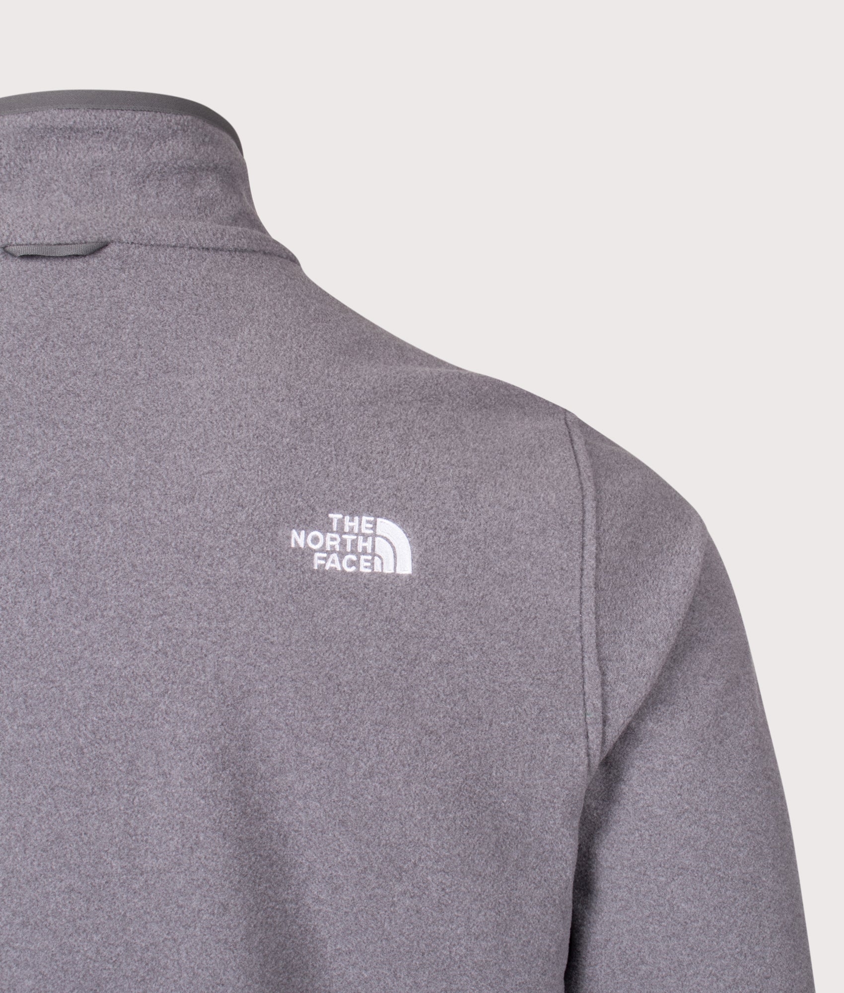 The North Face Glacier Zip Through Fleece in TNF Mid Grey Heather at EQVVS Menswear. Back detail shot.