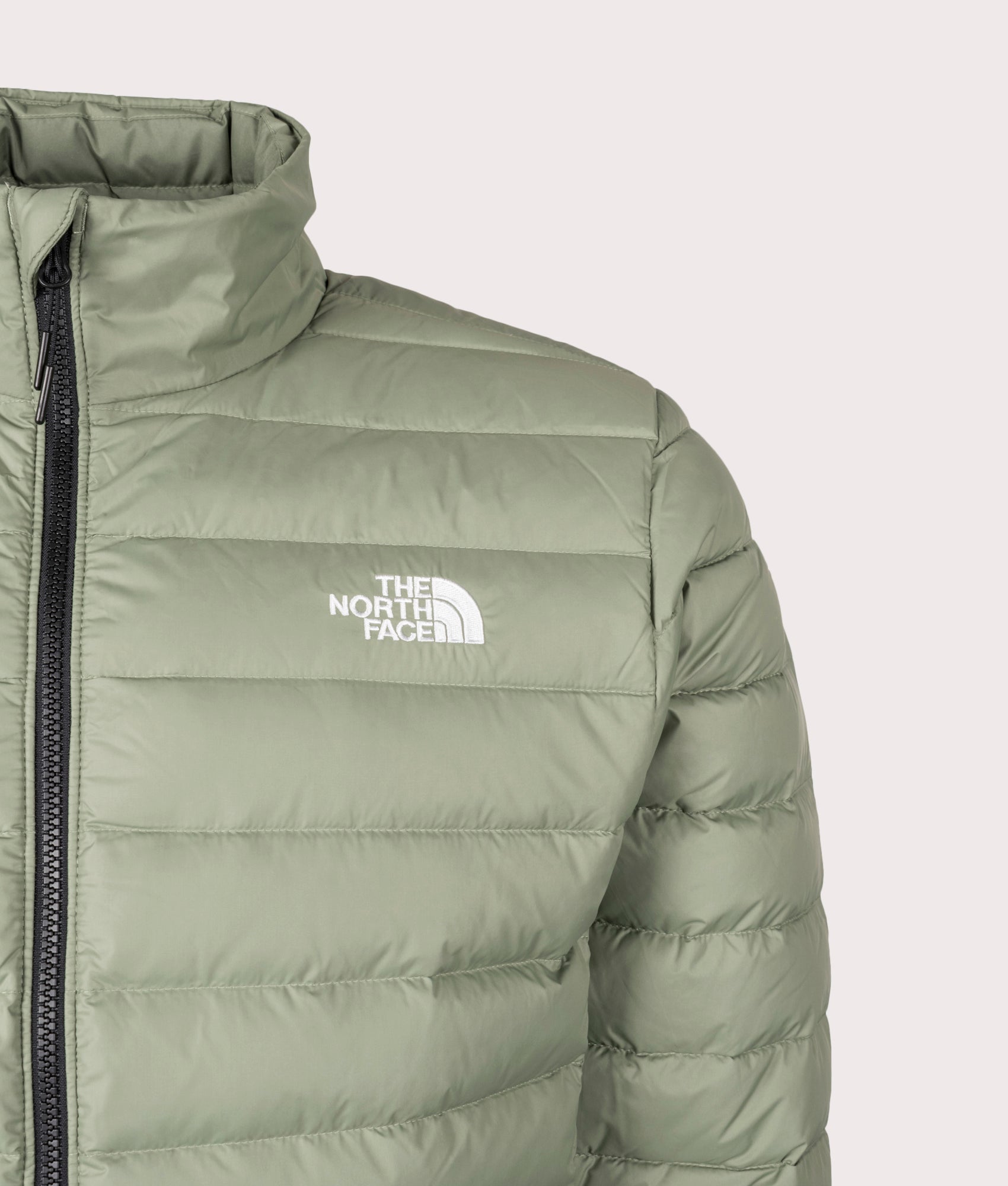  The North Face Classic Down Jacket in Bark Mist at EQVVS Menswear. Front detail shot.