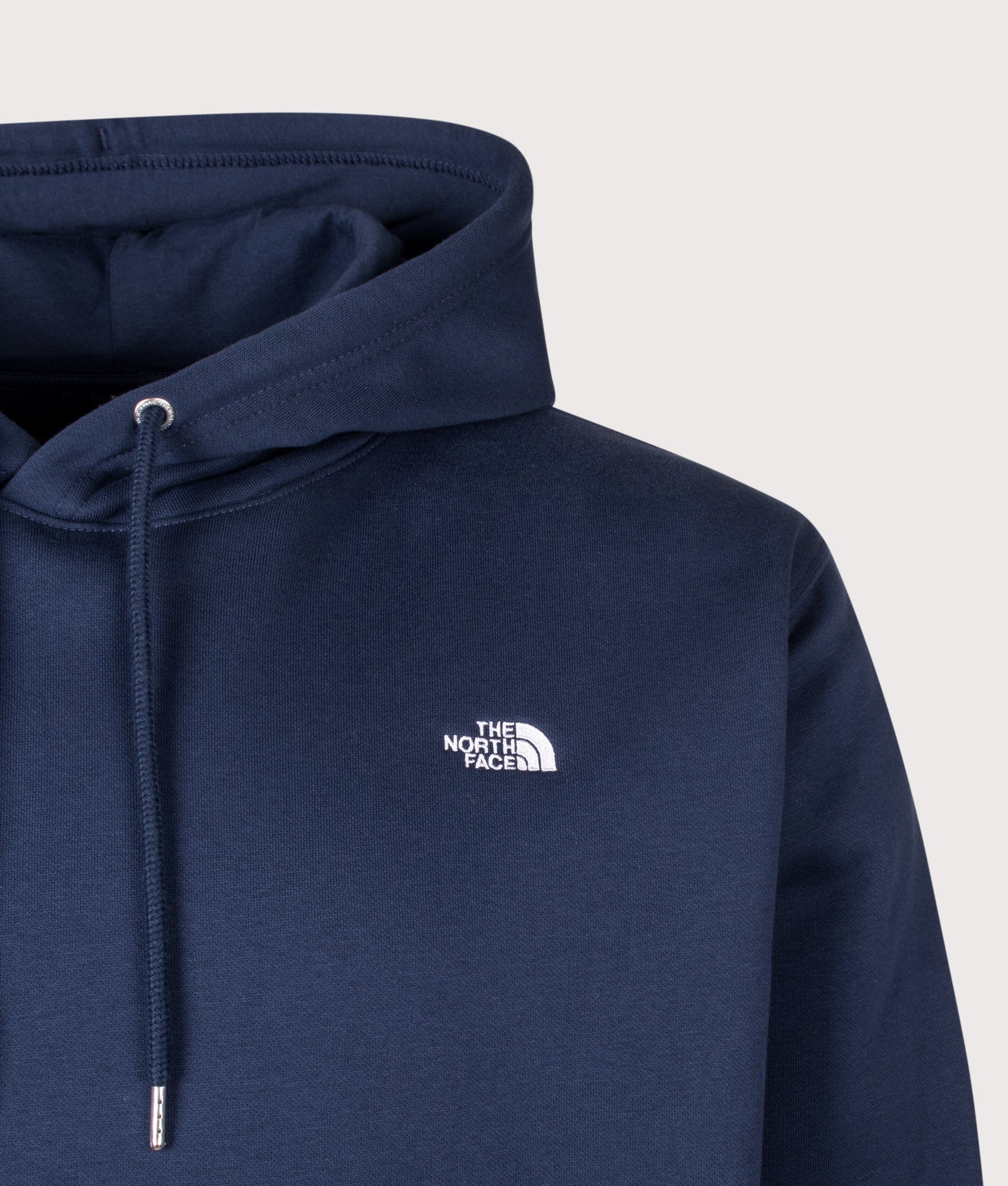 The North Face Relaxed Fit Essential Simple Dome Hoodie in Summit Navy at EQVVS Menswear. Detail shot.