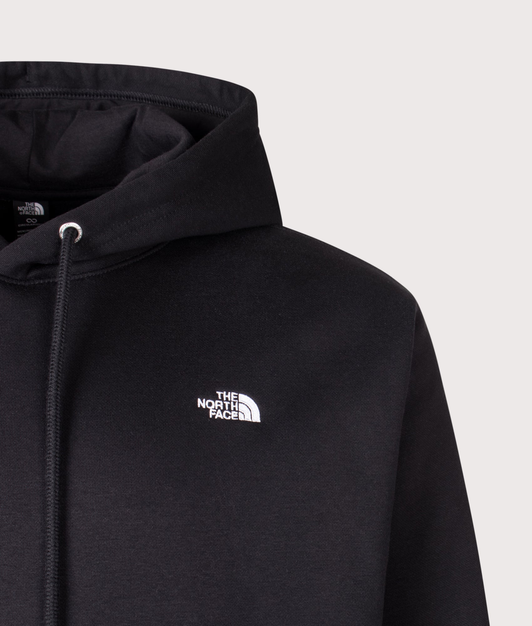 The North Face Relaxed Fit Essential Simple Dome Hoodie in TNF Black at EQVVS Menswear. Detail shot.