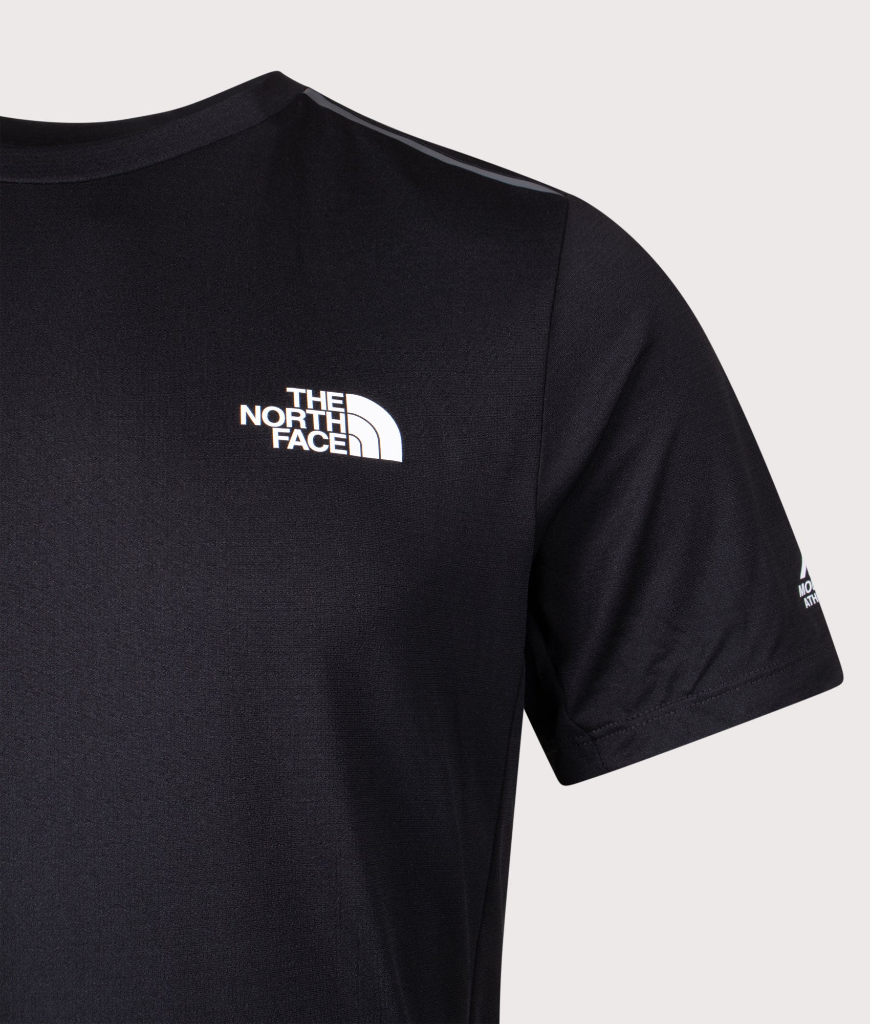 The North Face Mountain Athletics Tape T-Shirt in Black at EQVVS Menswear. Detail shot.