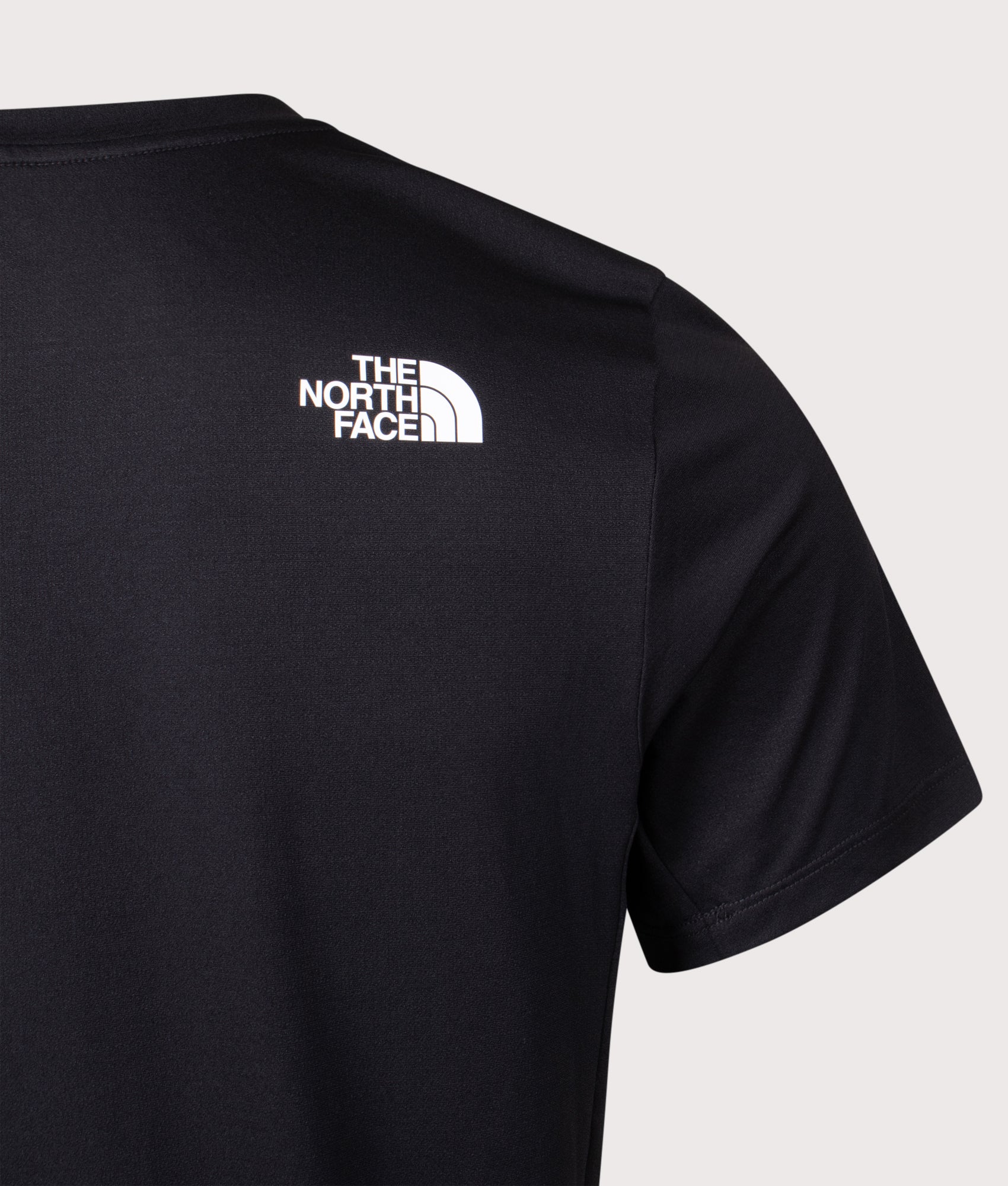 The North Face Mountain Athletics Tape T-Shirt in Black at EQVVS Menswear. Back detail shot.