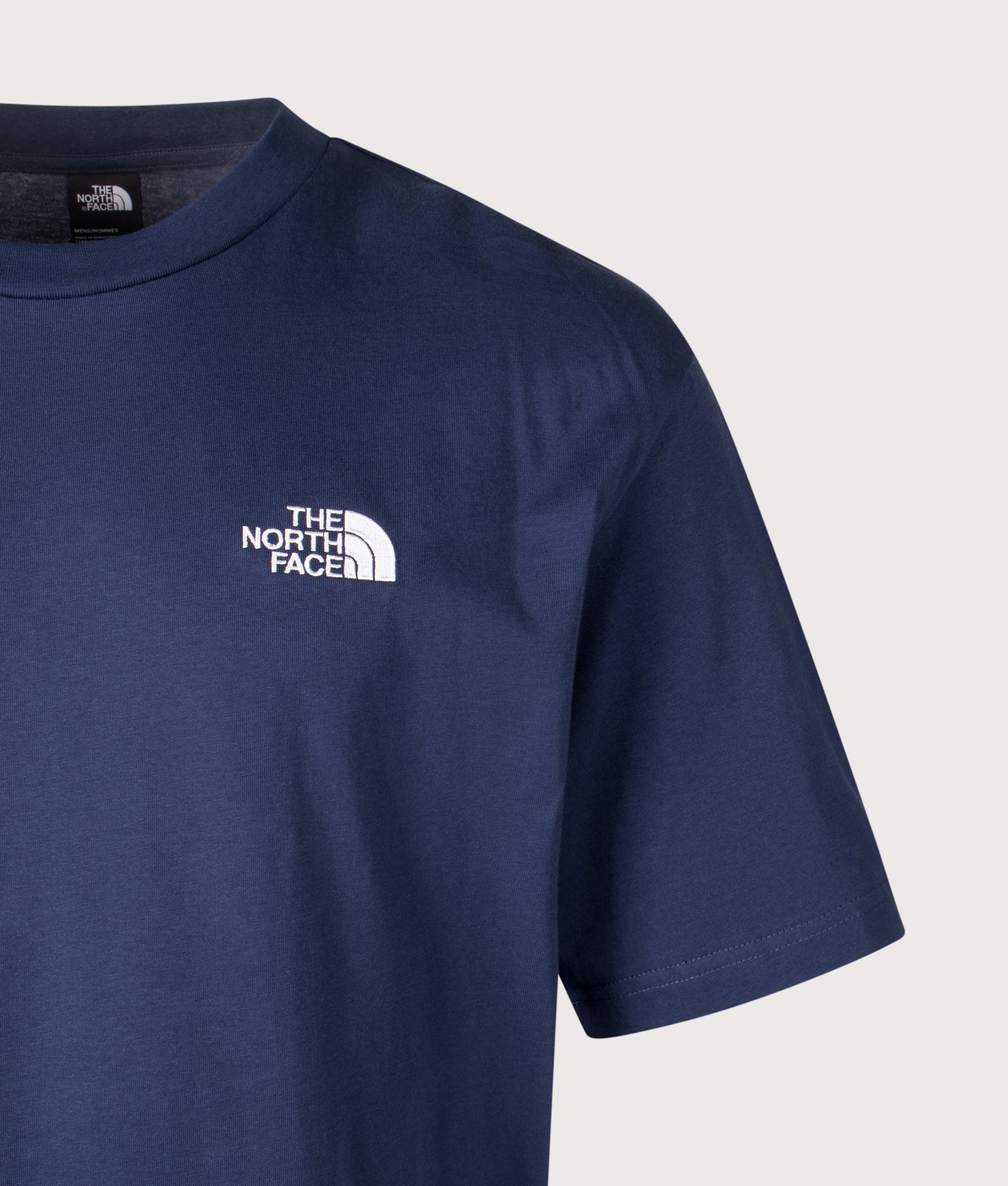 The North Face Essential Oversized T-Shirt in Summit Navy at EQVVS Menswear. Detail shot.