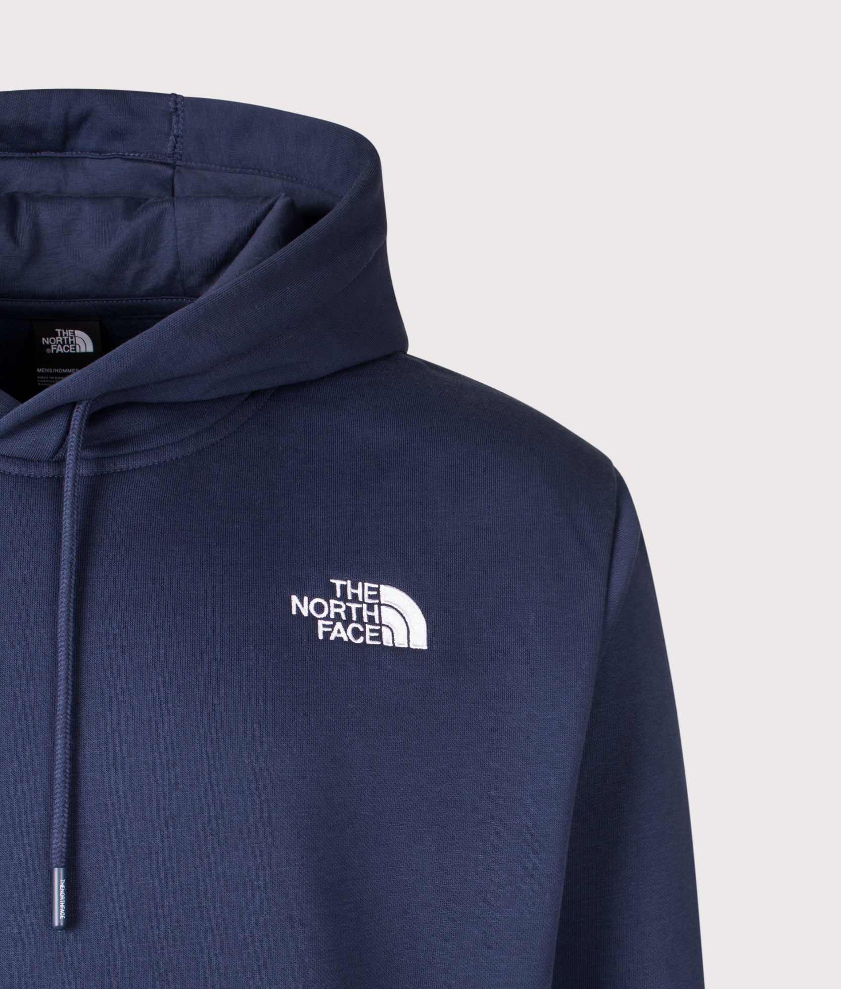 Essential Relaxed Hoodie. Shot by EQVVS. Front detail shot.