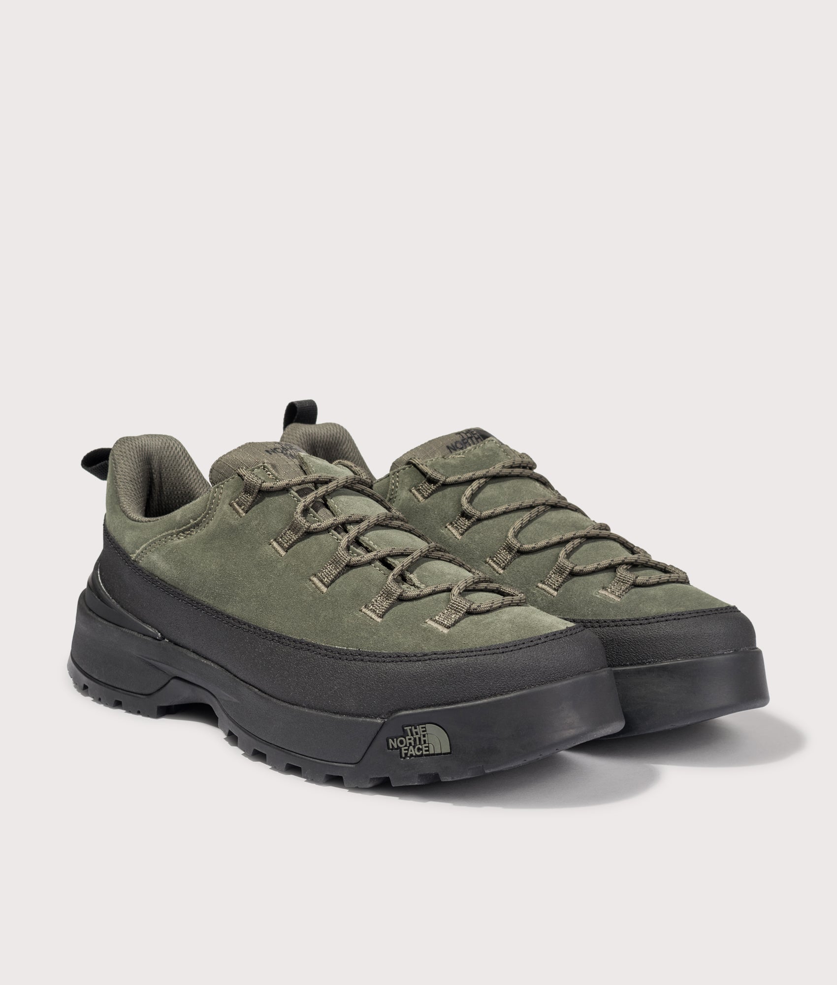 Glenclyffe Urban Low Shoes in Green/TNFBlack by| The North Face. Shot by EQVVS. Front angled shot.