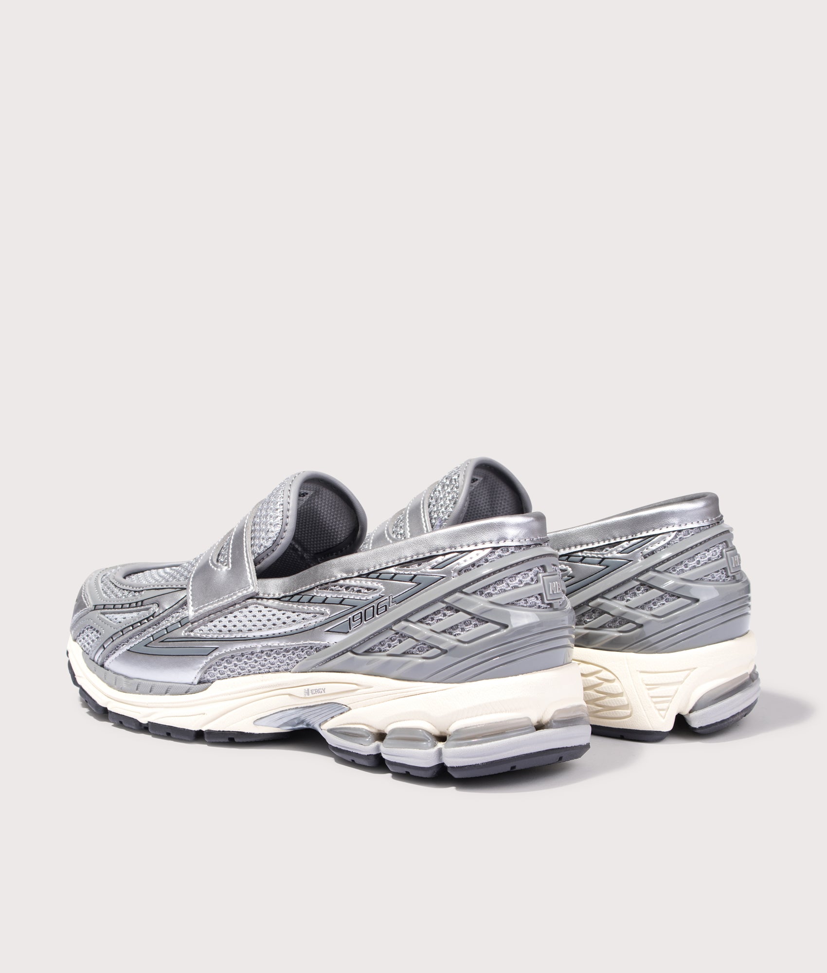 New Balance 1906L Loafers in Silver/Shadow Grey/Turtledove at EQVVS Menswear.  Angled back shot.
