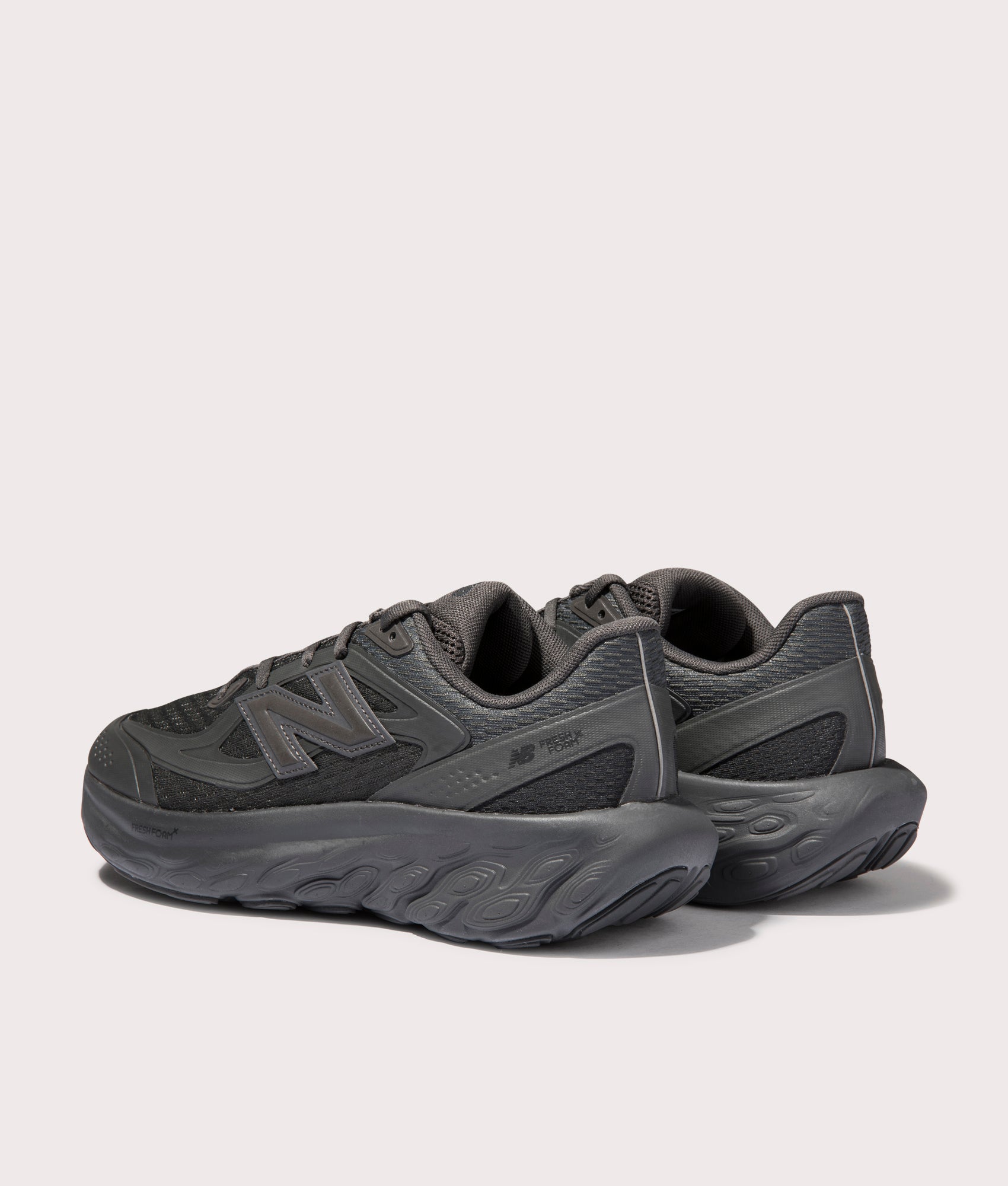 New Balance TRN Sneakers in Cement Black. Shot at EQVVS. Back shot 