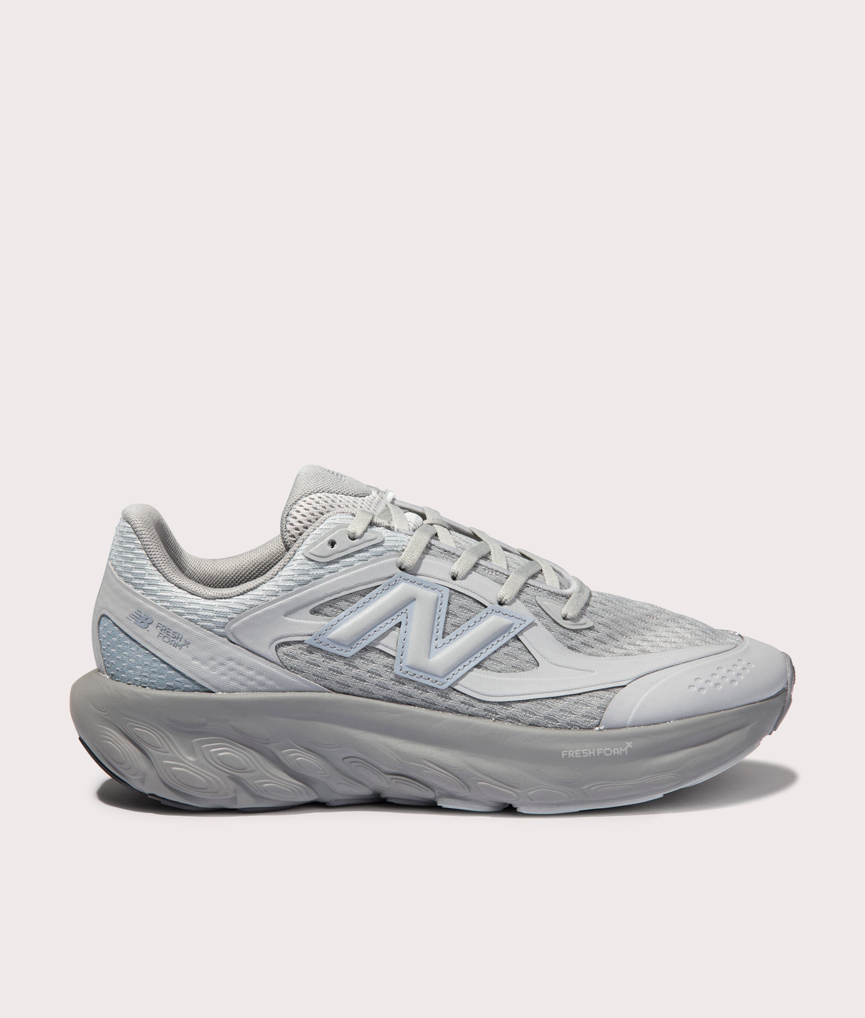 New Balance TRN Sneakers in Slate Grey. Shot at EQVVS.  Side shot 