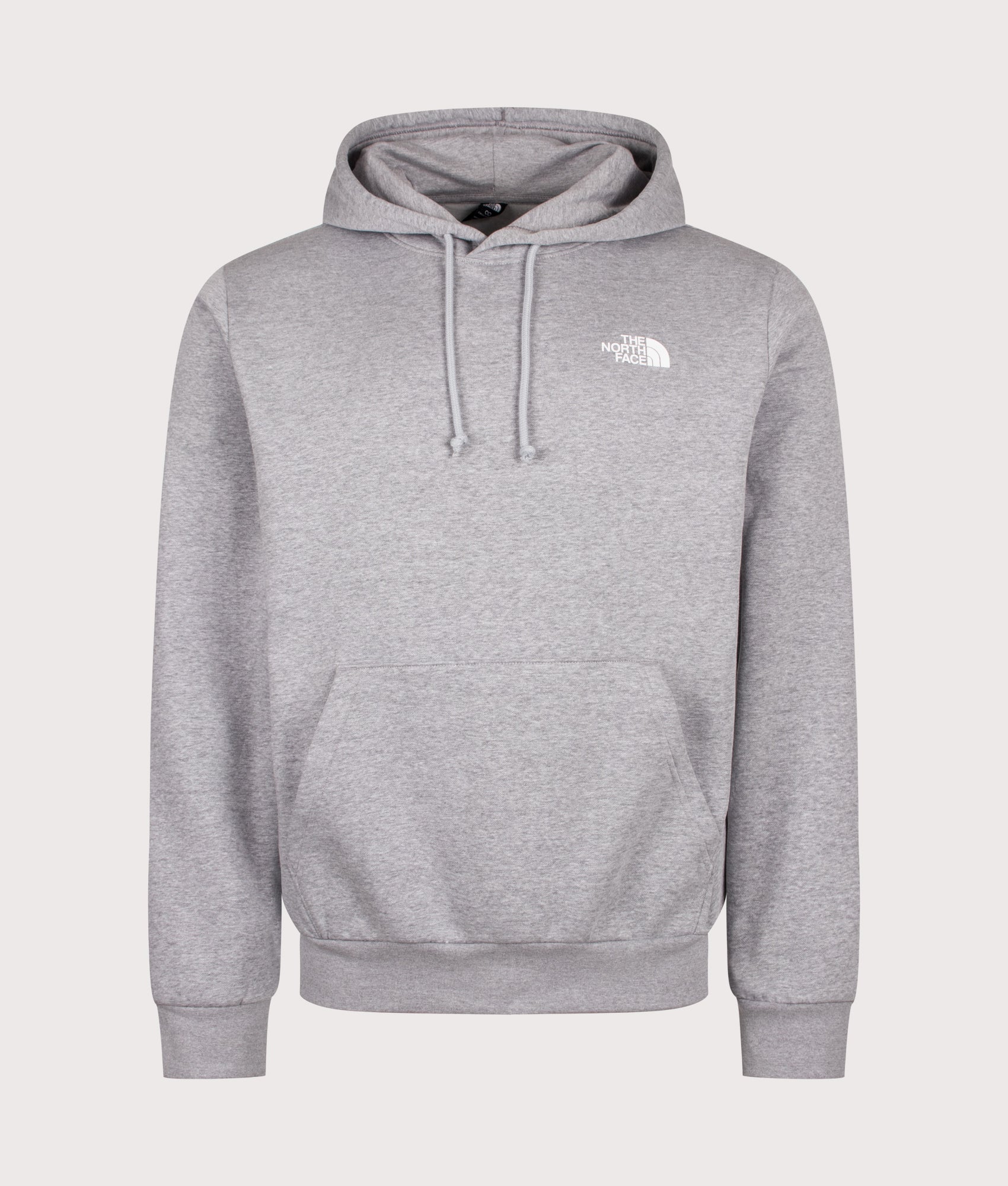 The North Face Regular Fit NSE Evolution Box Hoodie in TNF Pale Grey Heather at EQVVS Menswear. Front shot.