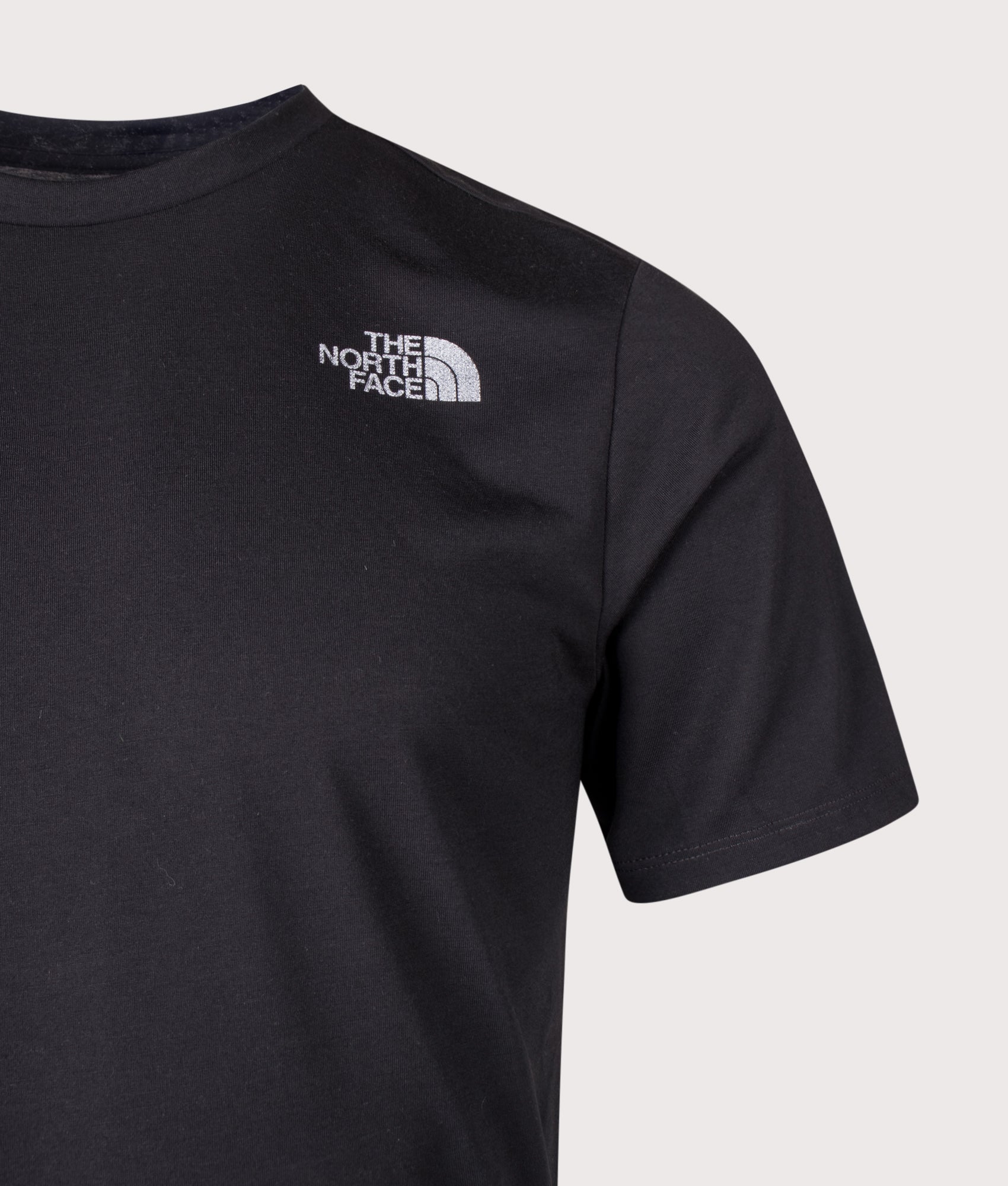 The North Face Bitmap Logo T-Shirt in TNF Black at EQVVS Menswear. Detail shot.