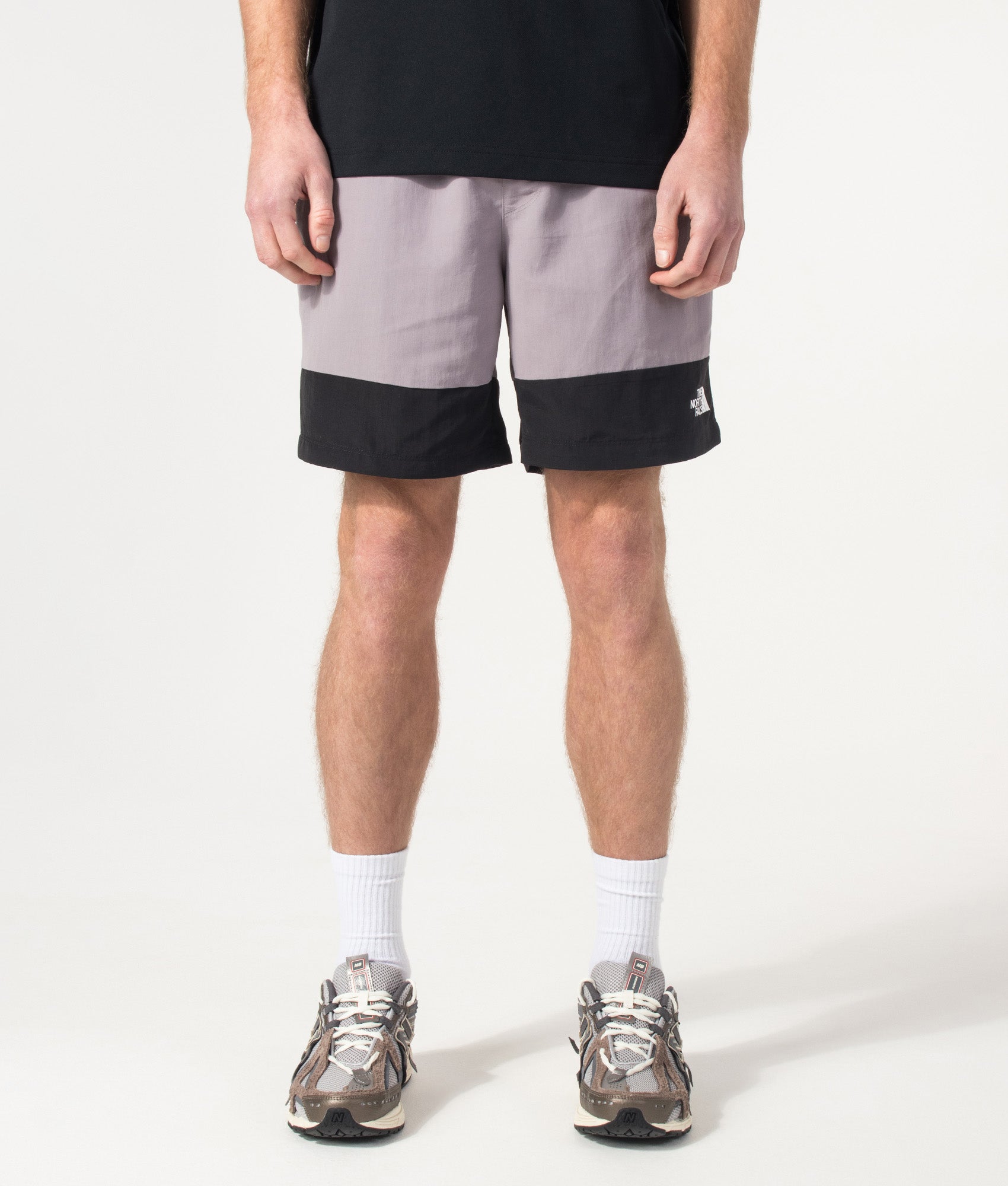 The North Face Leynar Shorts in Transcendent Grey and TNF Black at EQVVS Menswear. Model front shot.