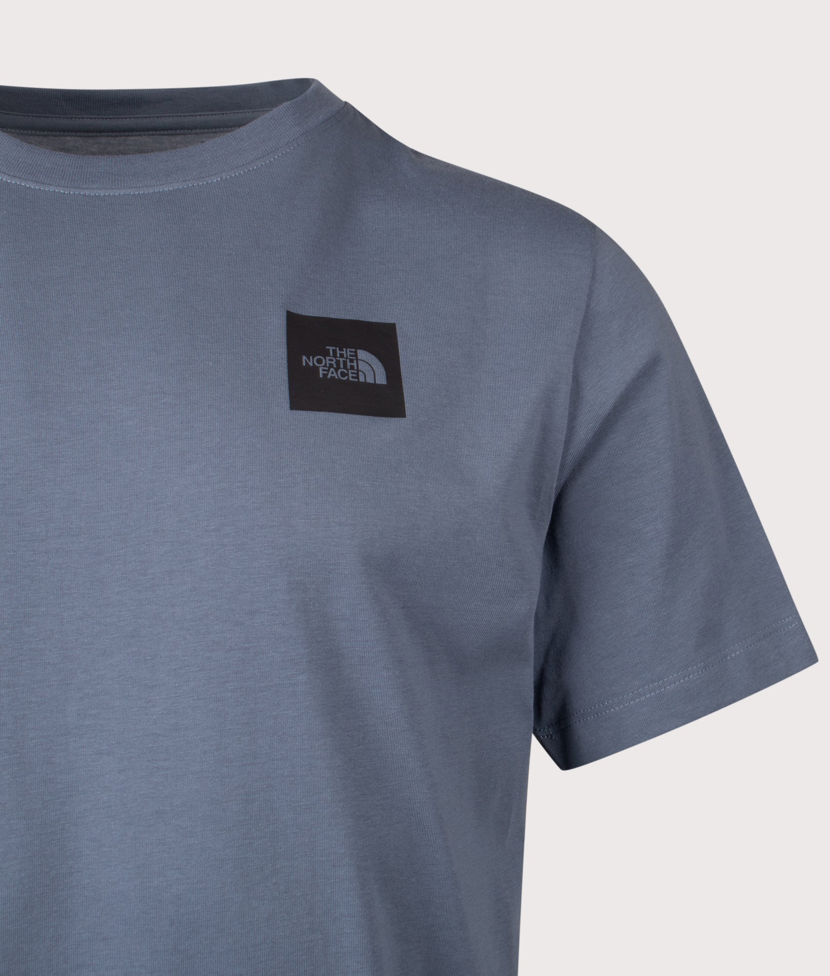 The North Face Evolution Box Half Dome T-Shirt in Granite Grey at EQVVS Menswear. Back shot.