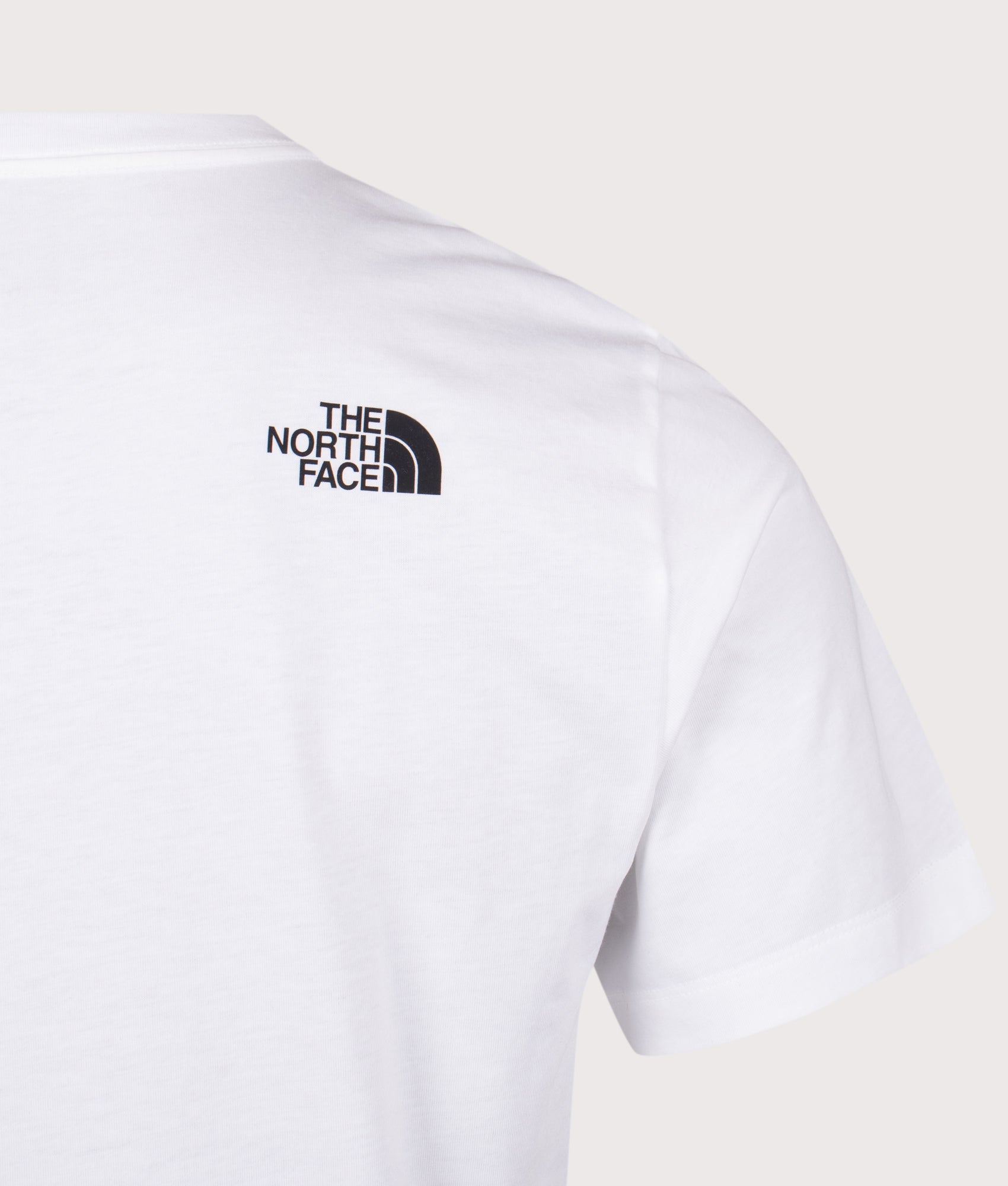 The North Face Evolution Box Half Dome T-Shirt in TNF White at EQVVS Menswear. Back detail shot.