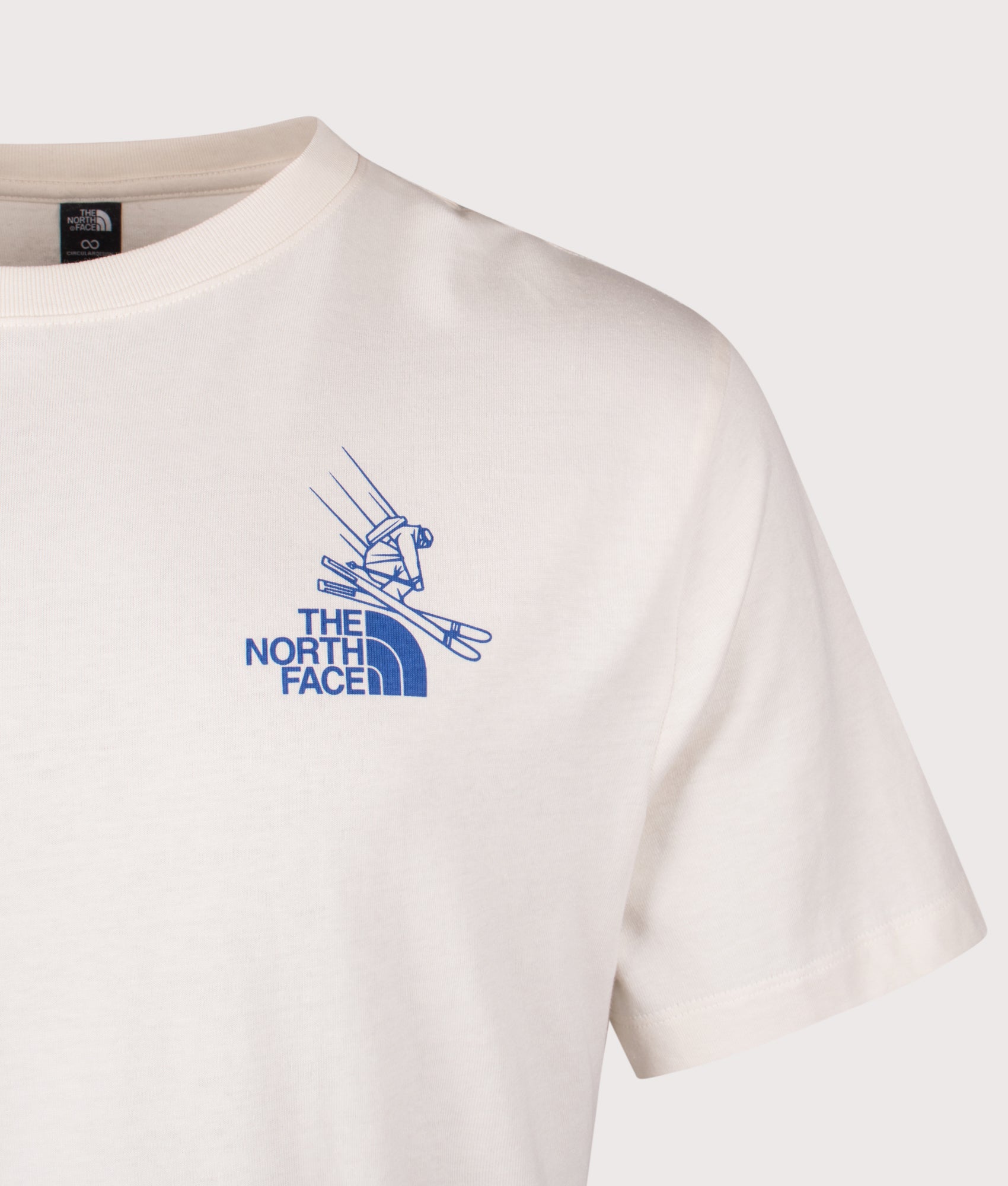 The North Face Mountain Celebration Graphic T-Shirt in White Dune at EQVVS Menswear. Detail shot.
