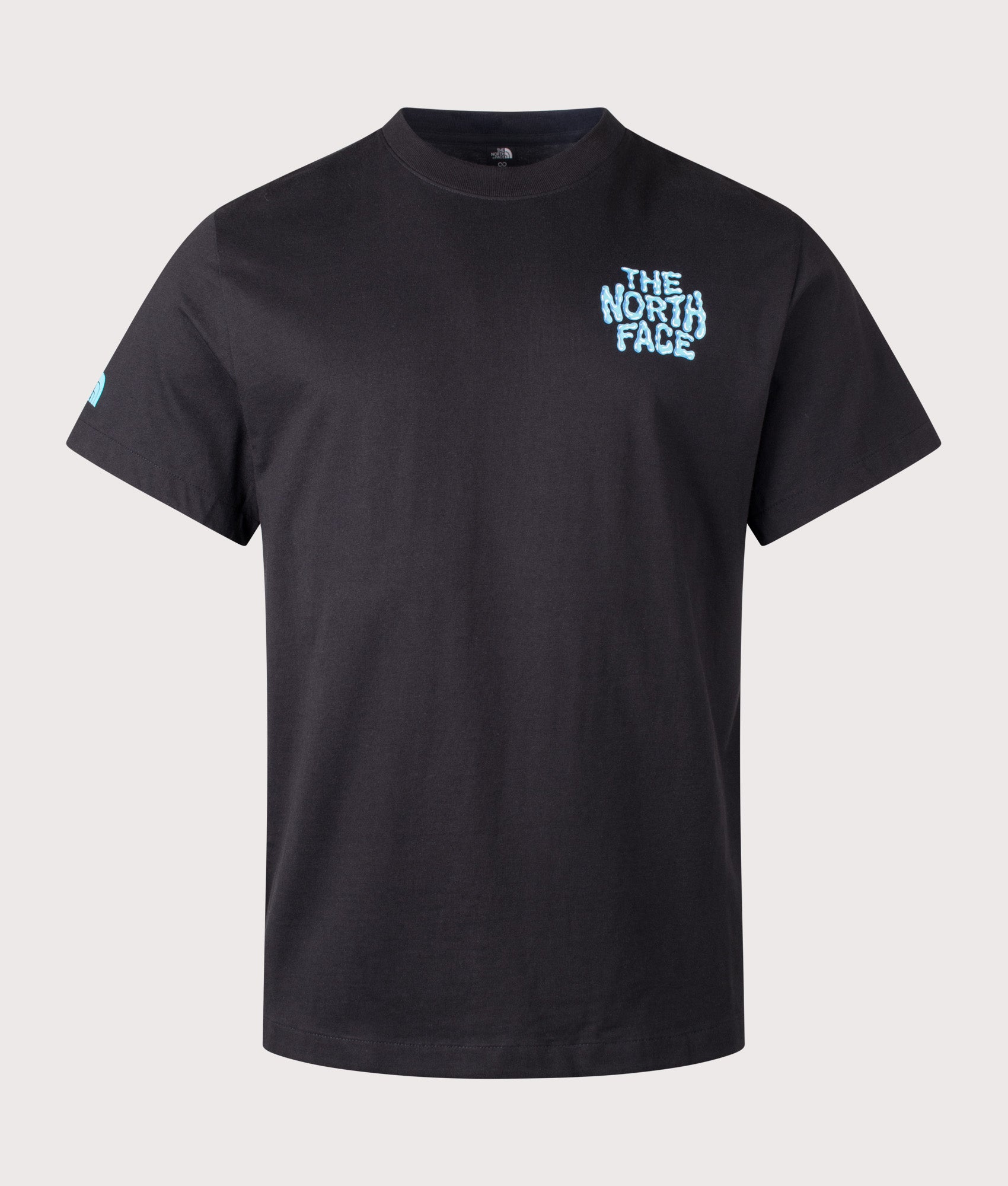 The North Face Relaxed Fit Drip Logo T-Shirt in TNF Black at EQVVS Menswear. Front shot.