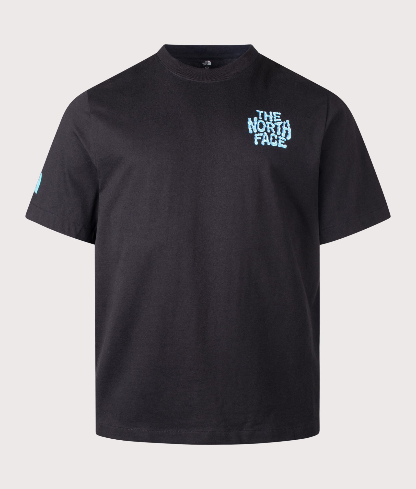 The North Face Relaxed Fit Drip Logo T-Shirt in TNF Black at EQVVS Menswear. Front shot.