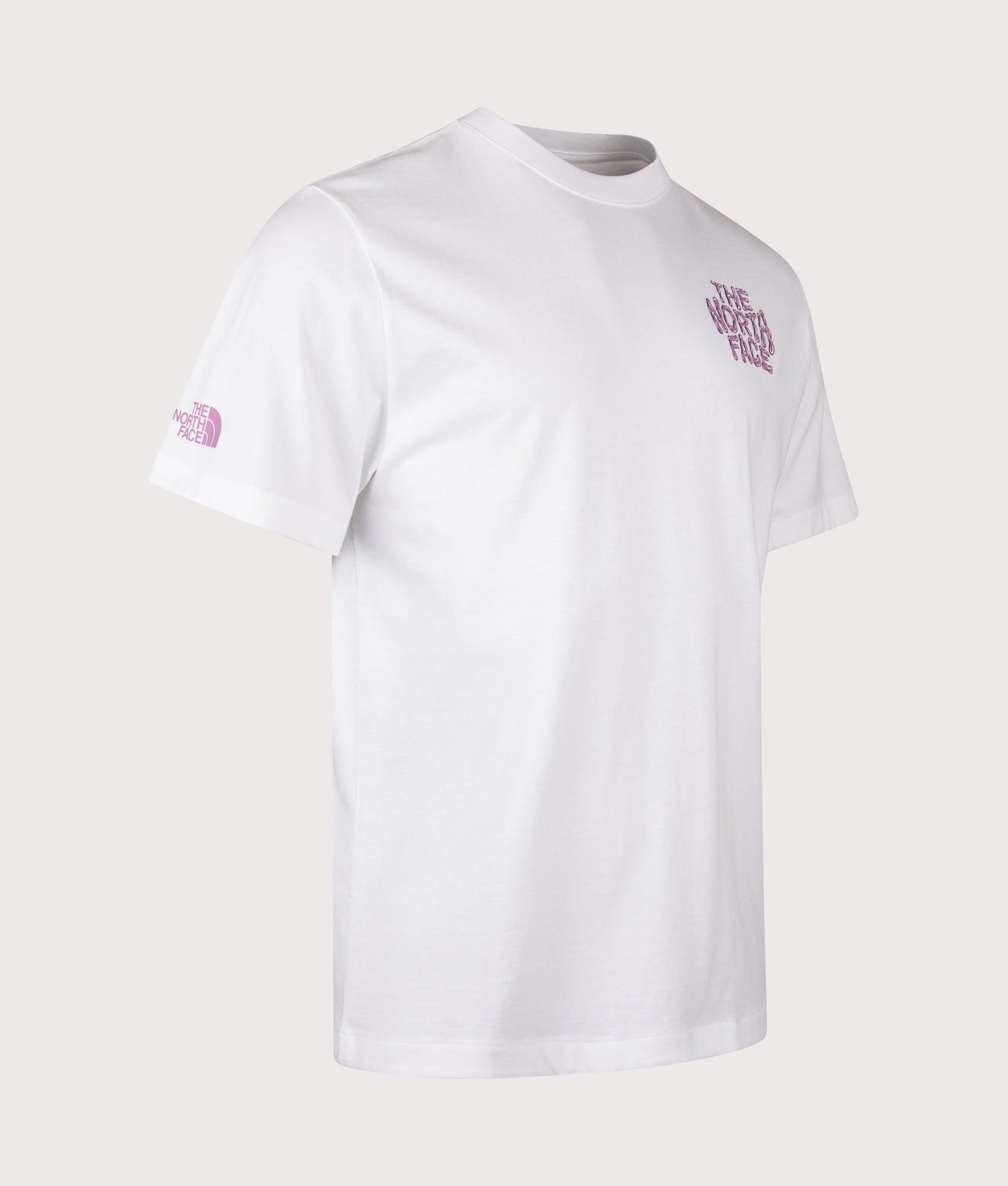Relaxed Fit Drip Logo T-Shirt in TNF White by The North Face. Front Angled Shot. Shot by EQVVS.
