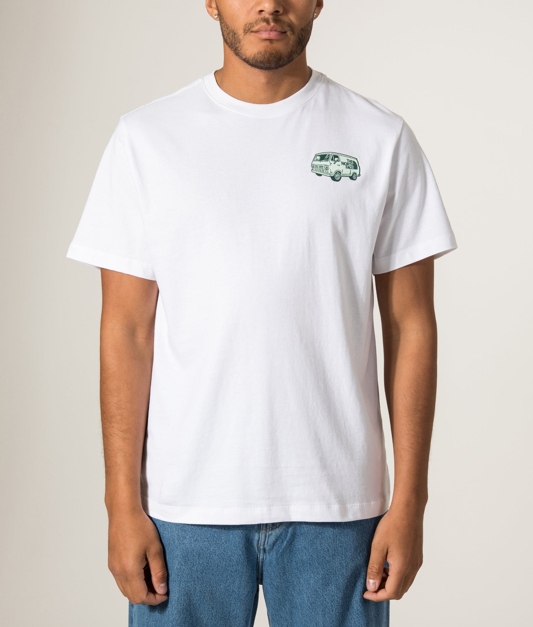 The North Face Relaxed Fit Van Life T-Shirt in TNF White at EQVVS Menswear. Model front shot.