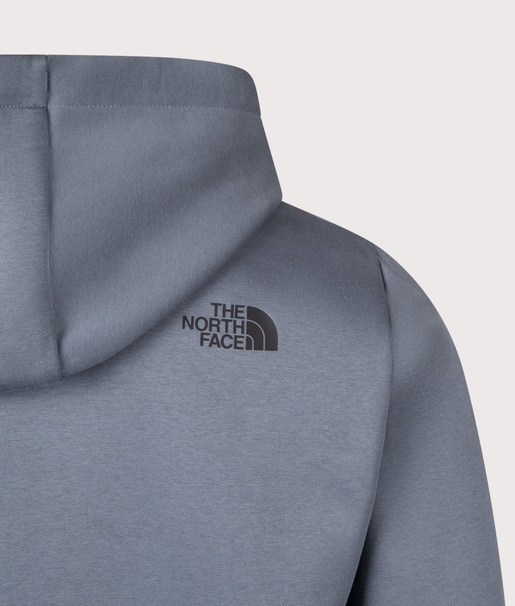 The North Face Evolution Box Hoodie in Granite Grey at EQVVS Menswear. Back detail shot.