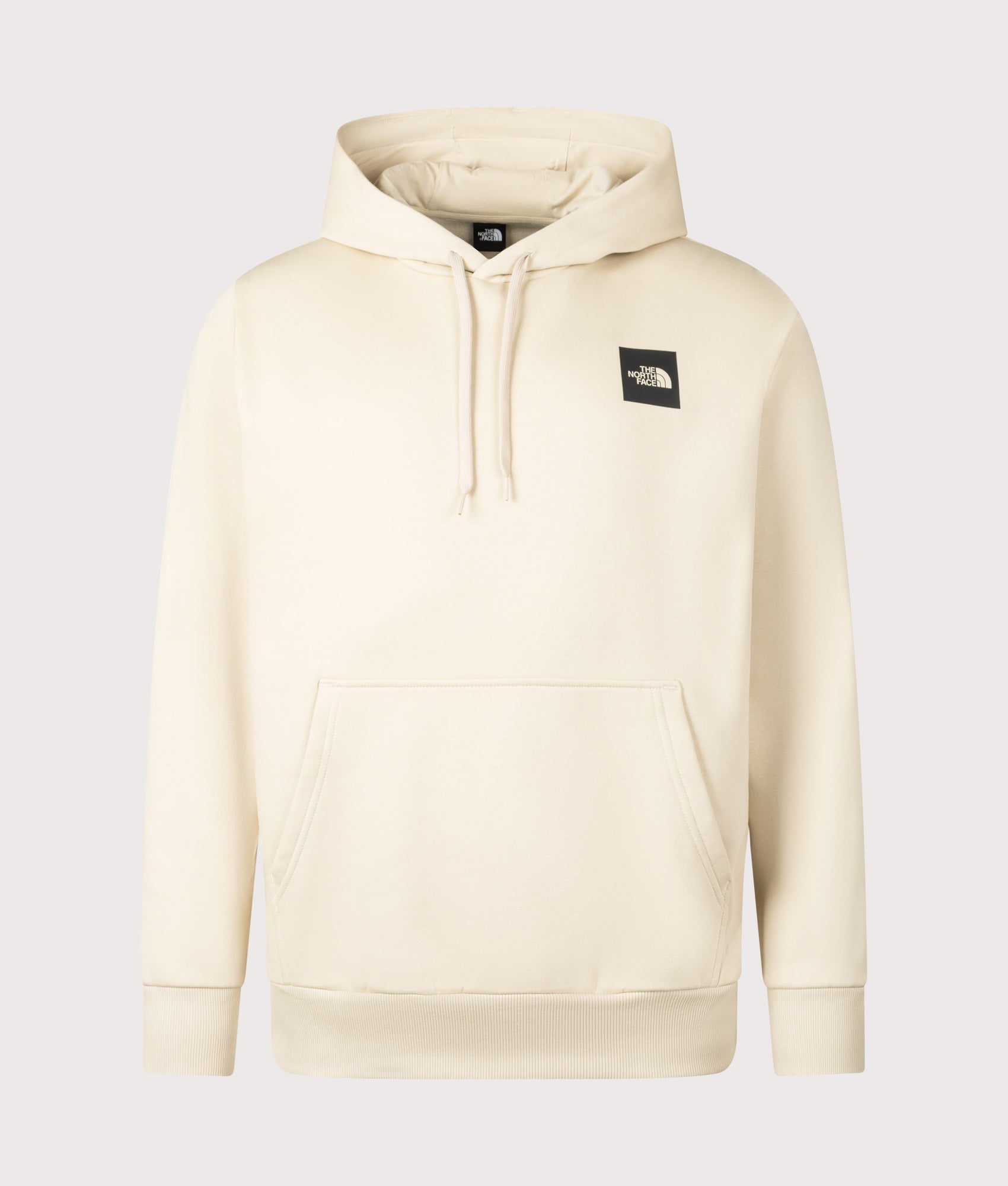 The North Face Evolution Box Hoodie in Desert Stone at EQVVS Menswear. Front shot.