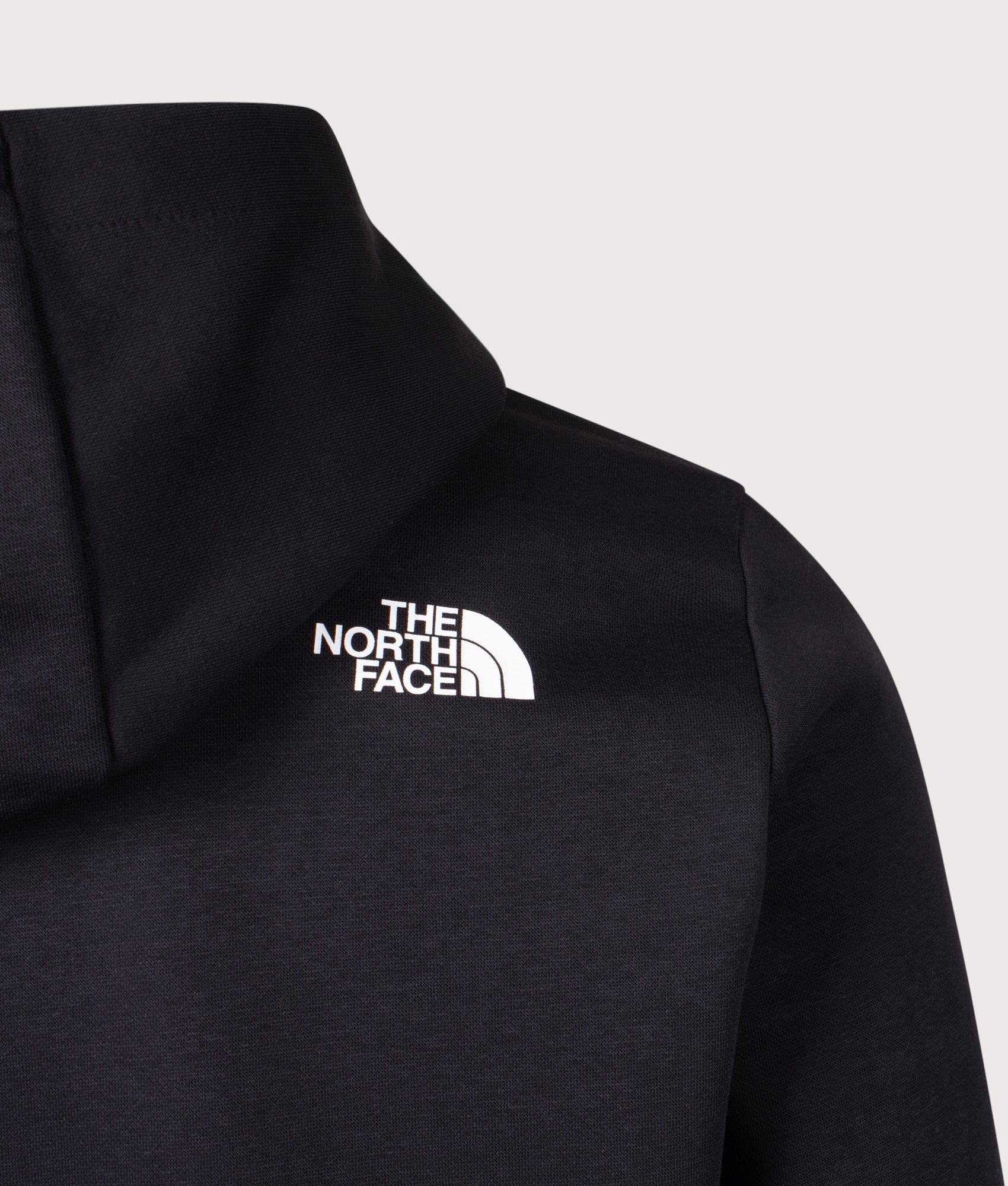 The North Face Evolution Box Hoodie in TNF Black at EQVVS Menswear. Back detail shot.