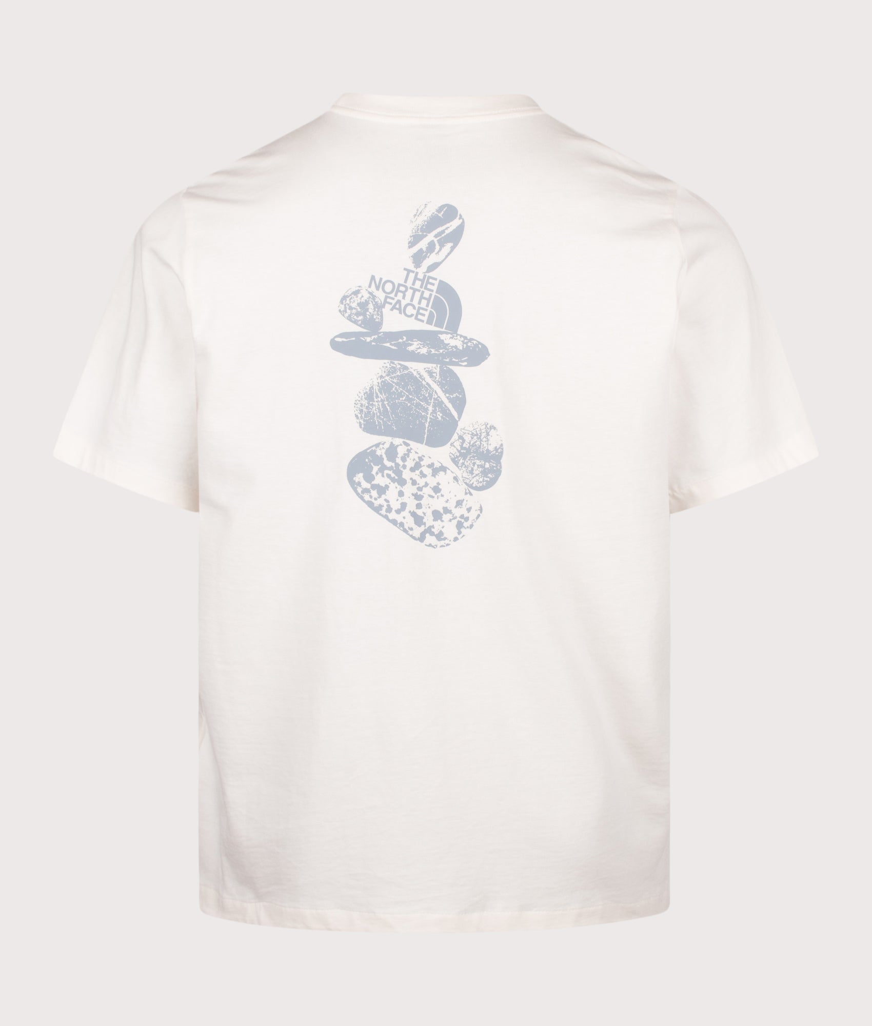 The North Face Relaxed Fit Stones Graphic T-Shirt in White Dune at EQVVS Menswear. Back shot.