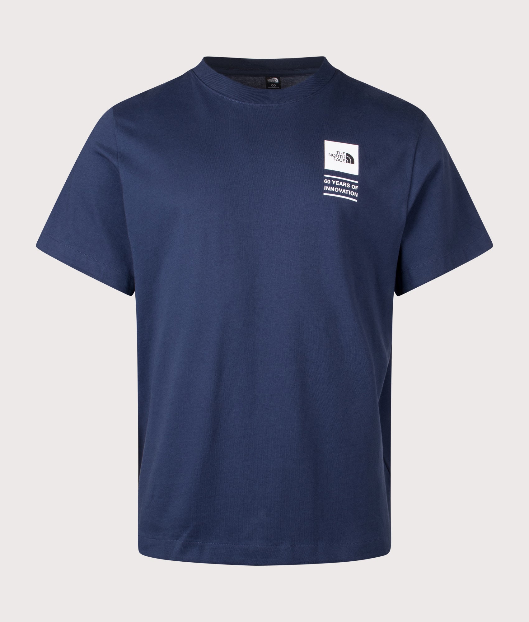 The North Face Relaxed Fit Celebration TNF T-Shirt in Summit Navy at EQVVS Menswear. Front shot.