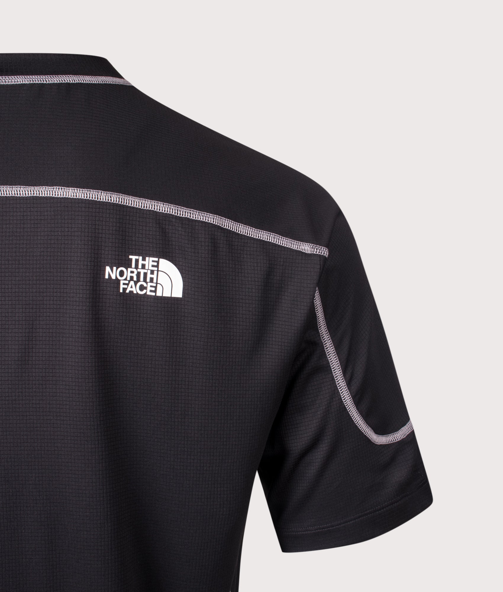 The North Face Relaxed Fit NSE Lightrange T-Shirt in TNF Black at EQVVS Menswear. Back detail shot.