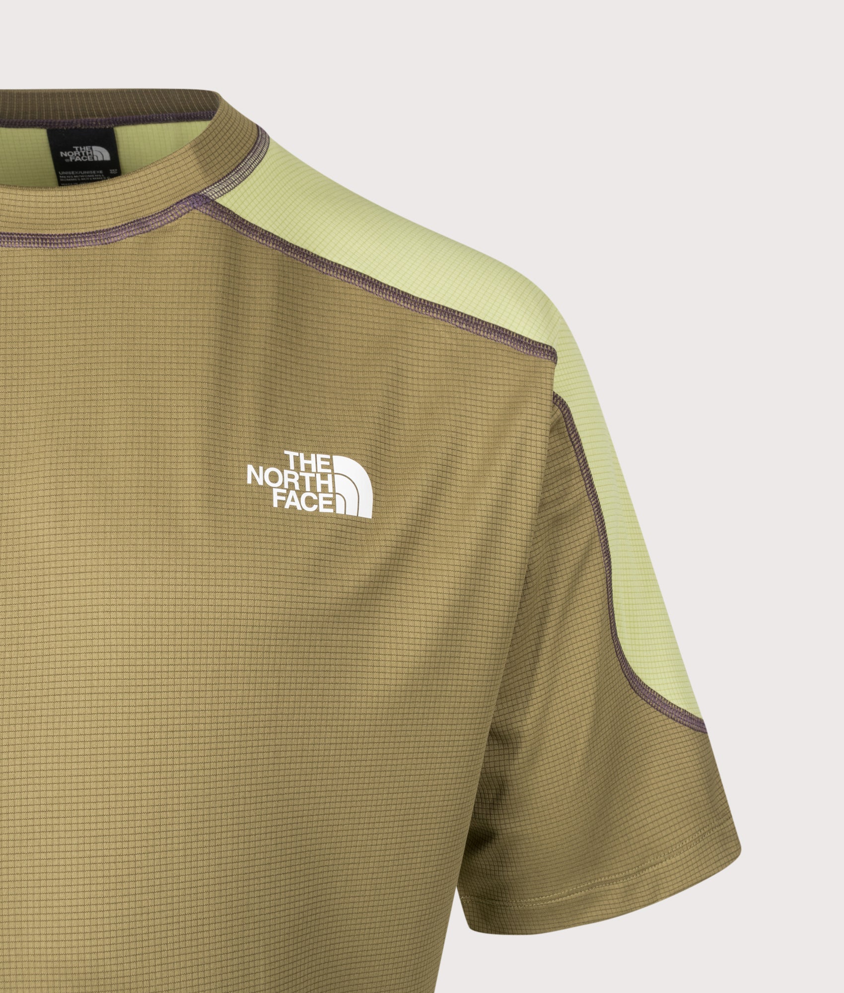 The North Face Relaxed Fit NSE Lightrange T-Shirt in Cedar and Pear at EQVVS Menswear. Front detail shot.