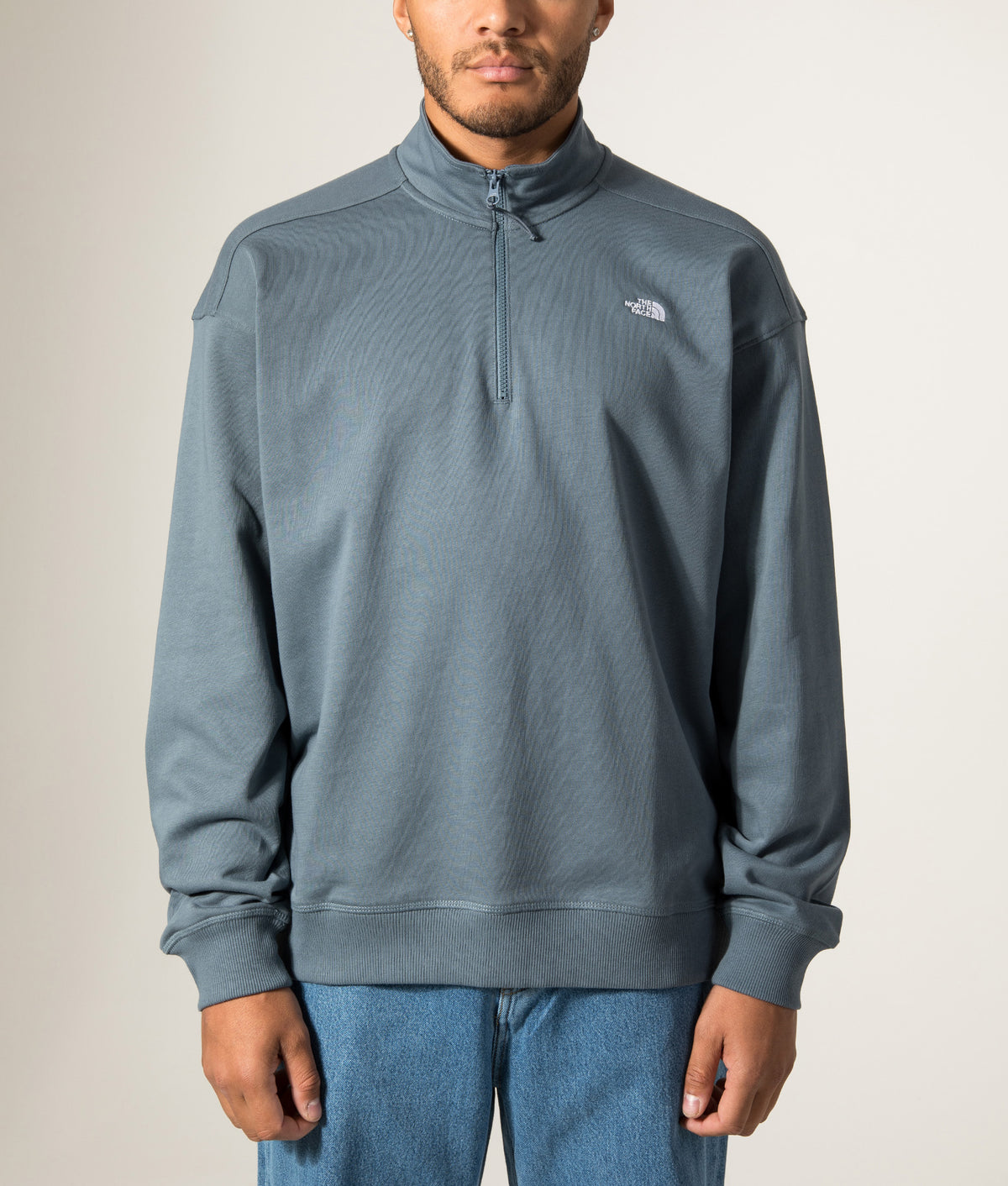 Relaxed Fit Essential Quarter Zip Sweatshirt in Anthracite Grey by The North Face. - Fit reference