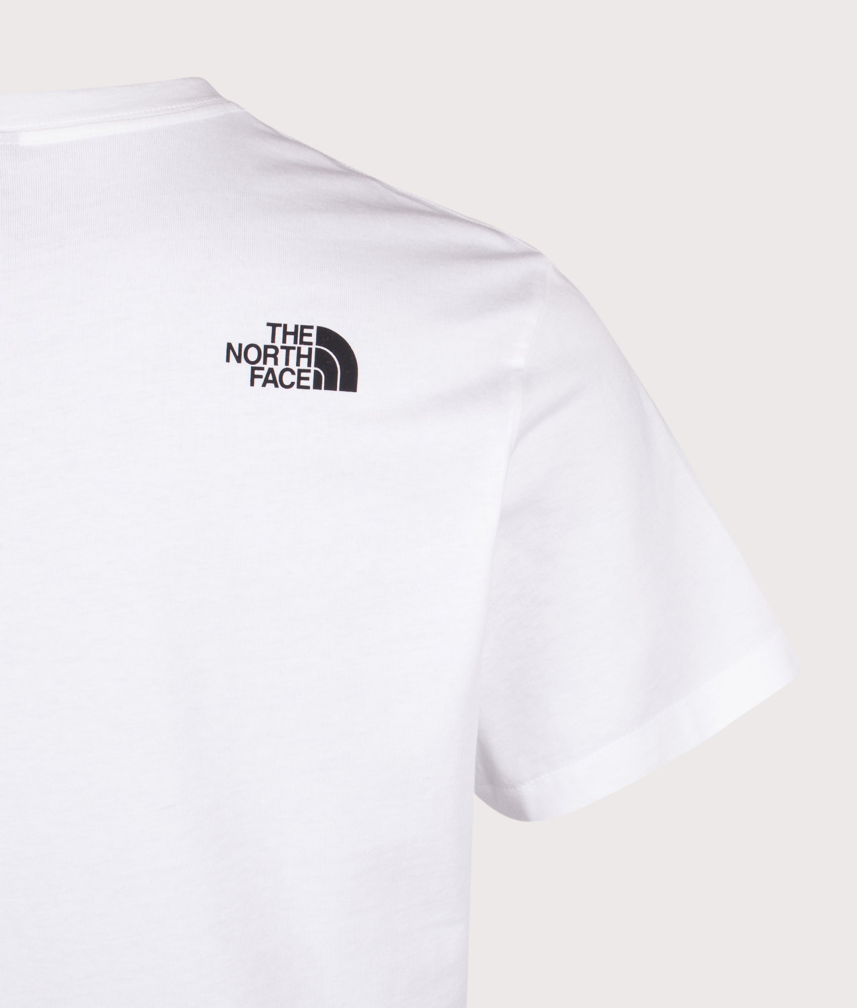 The North Face Relaxed Fit Mountain Logo T-Shirt in TNF White at EQVVS Menswear. Back detail shot.