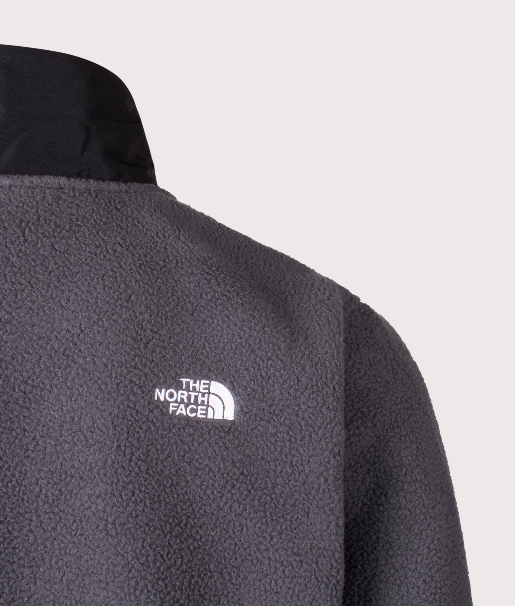 The North Face Yumiori Off-Peak Quarter Zip Fleece in Asphalt Grey and TNF Black at EQVVS Menswear. Back detail shot.