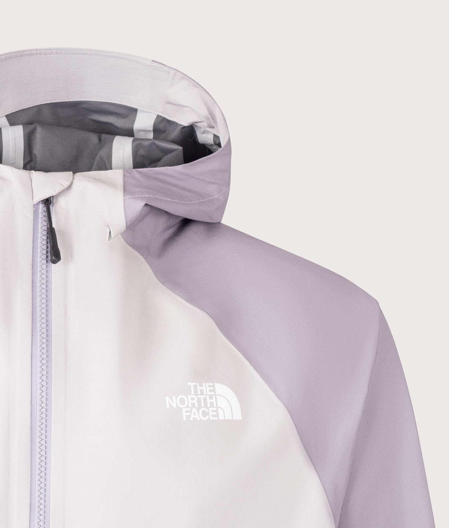 The North Face NSE Rain Jacket in Ashes Of Roses Grey and Transcendent Grey at EQVVS Menswear. Detail shot.