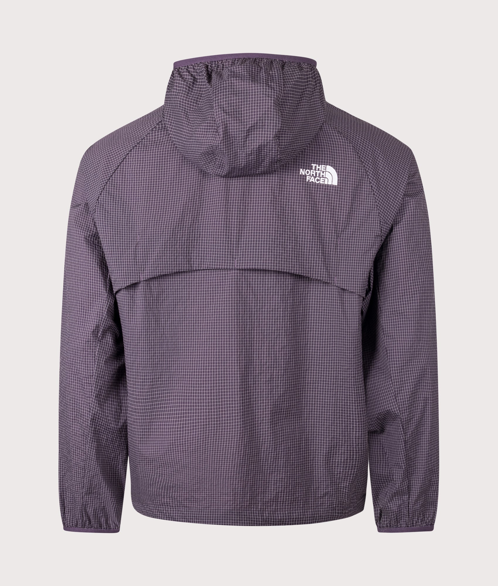 The North Face Relaxed Fit NSE Windbreaker in Endless Dusk at EQVVS Menswear. Back shot.