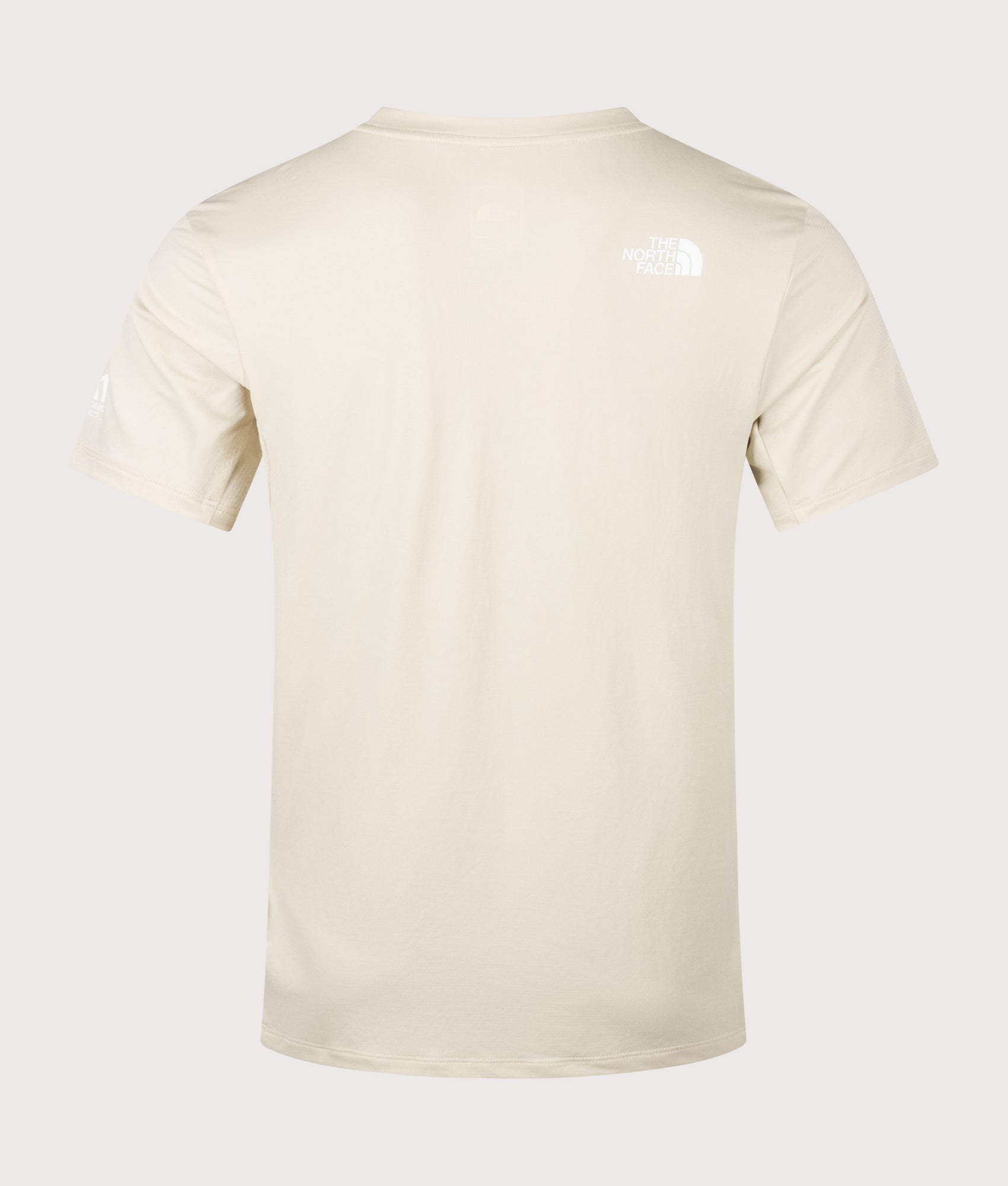 The North Face Mountain Athletics Tape T-Shirt in Desert Stone at EQVVS Menswear. Back shot.