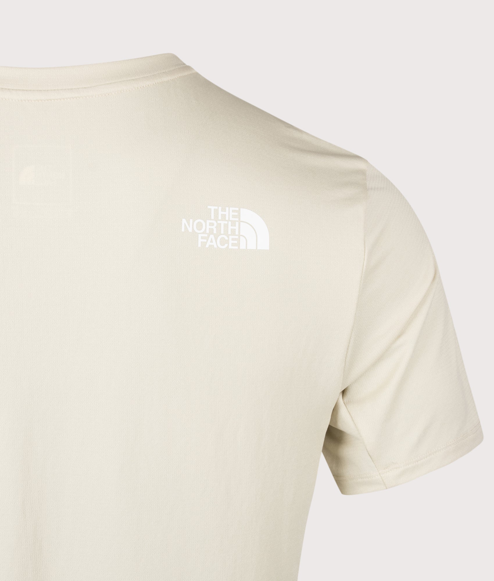 The North Face Mountain Athletics Tape T-Shirt in Desert Stone at EQVVS Menswear. Back detail shot.