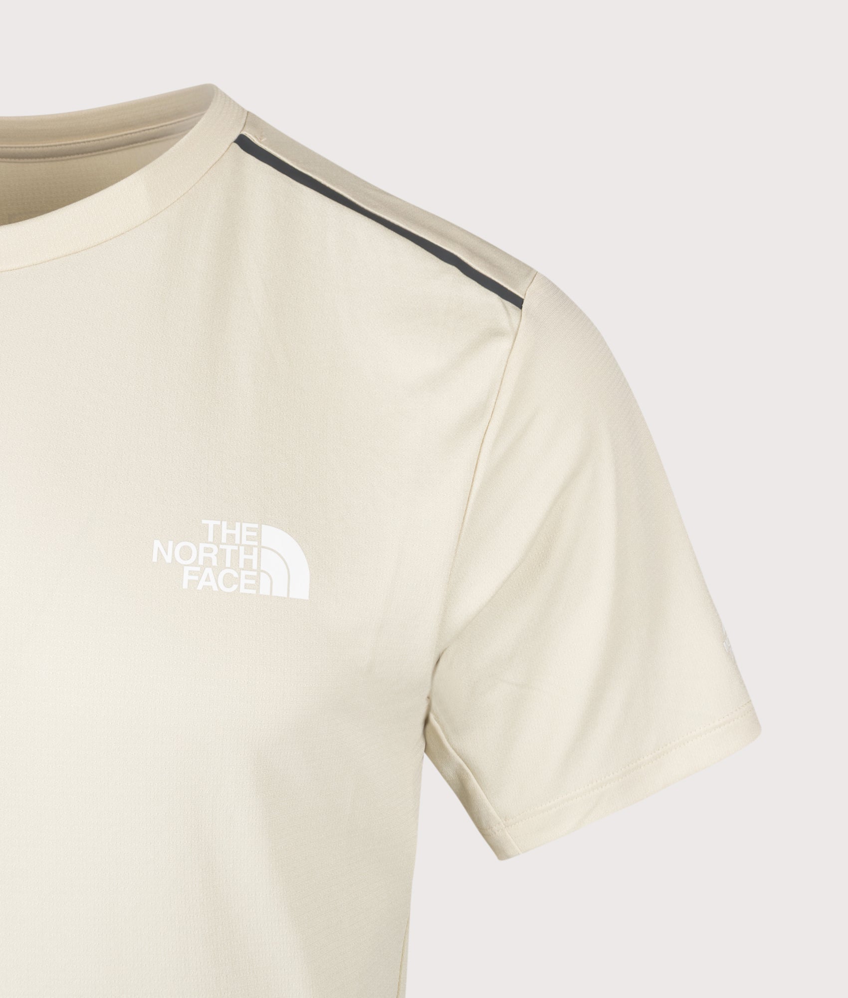 The North Face Mountain Athletics Tape T-Shirt in Desert Stone at EQVVS Menswear. Front detail shot.
